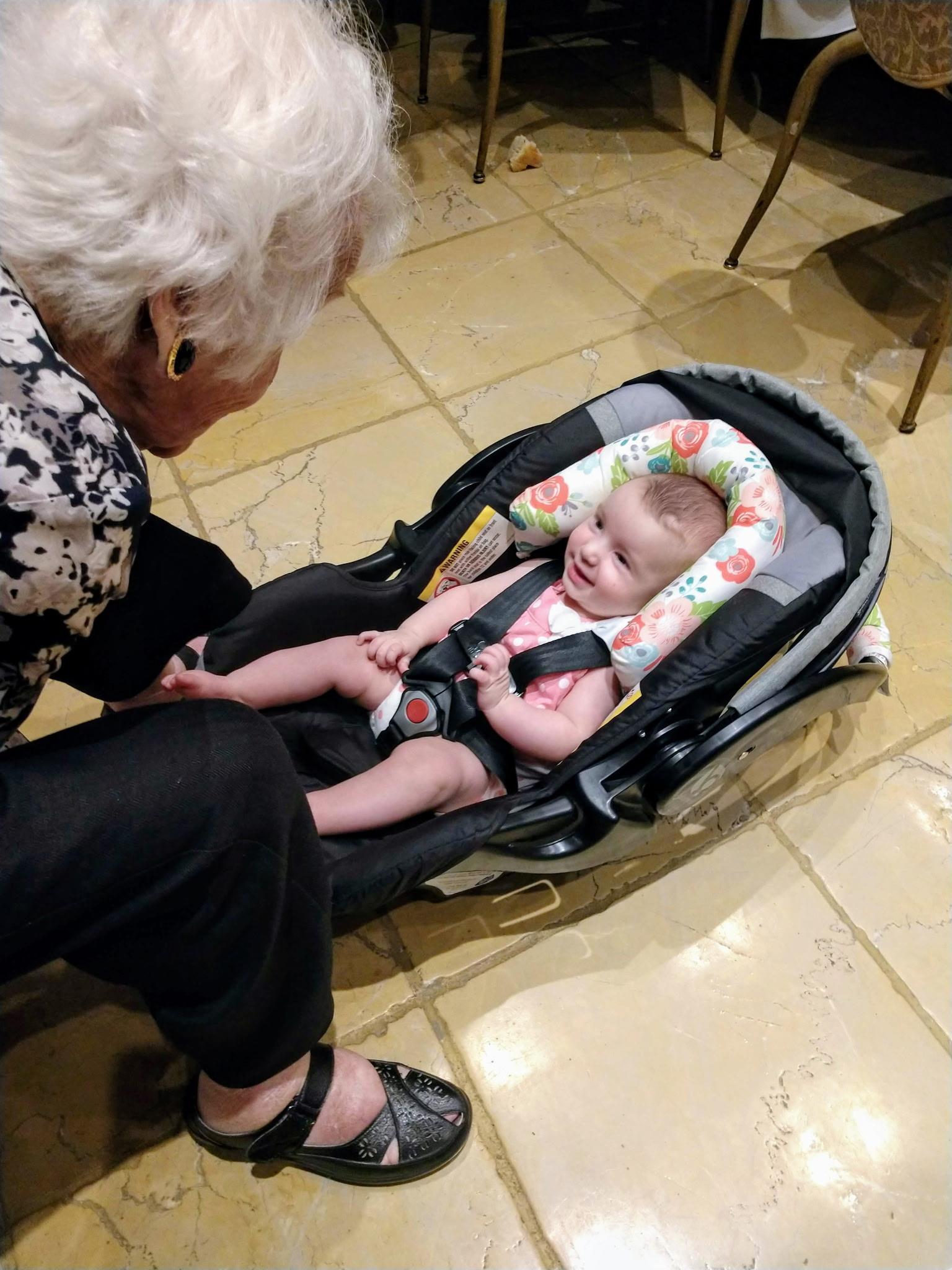A baby in a car seat