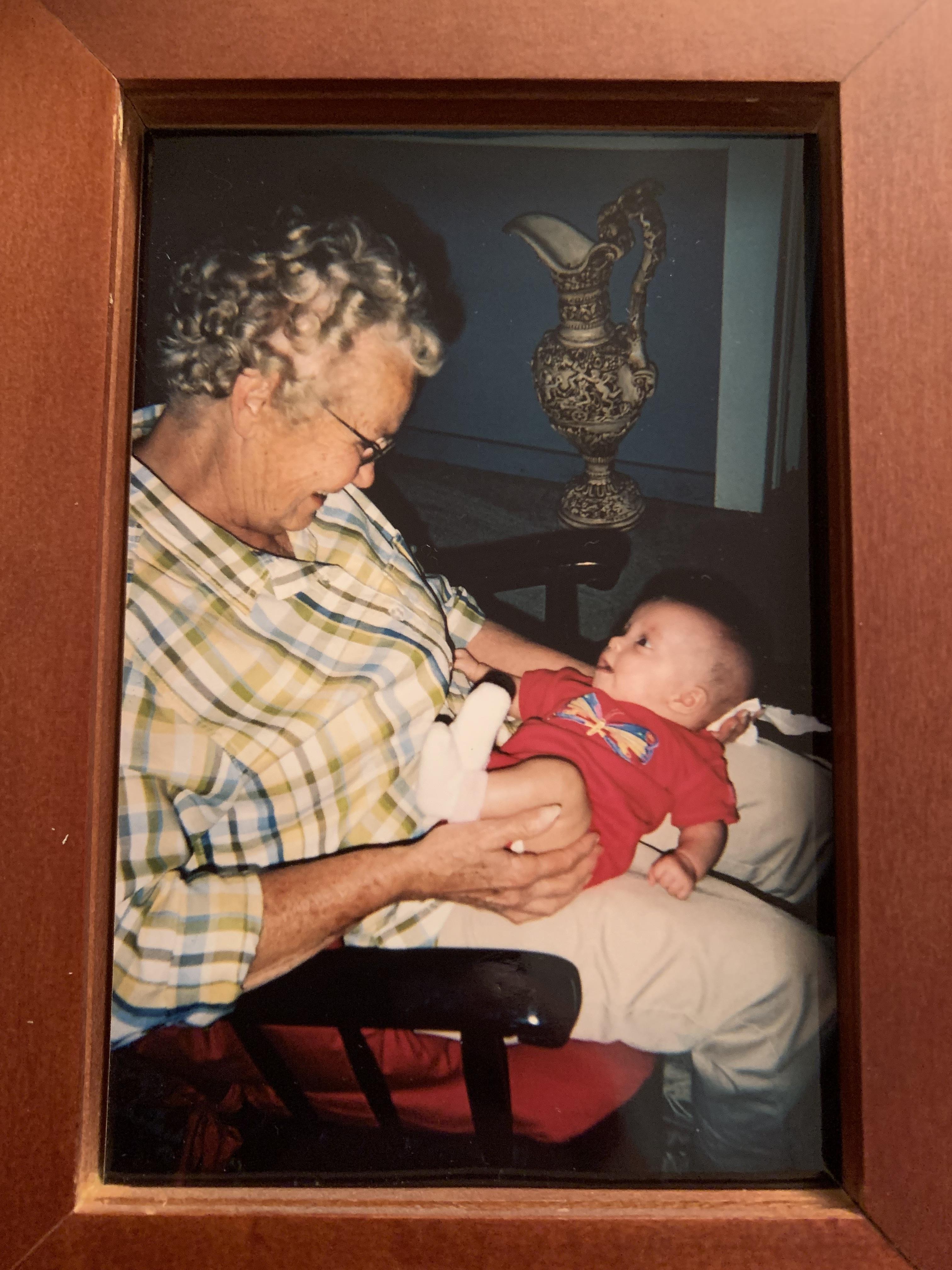 A woman holding a baby