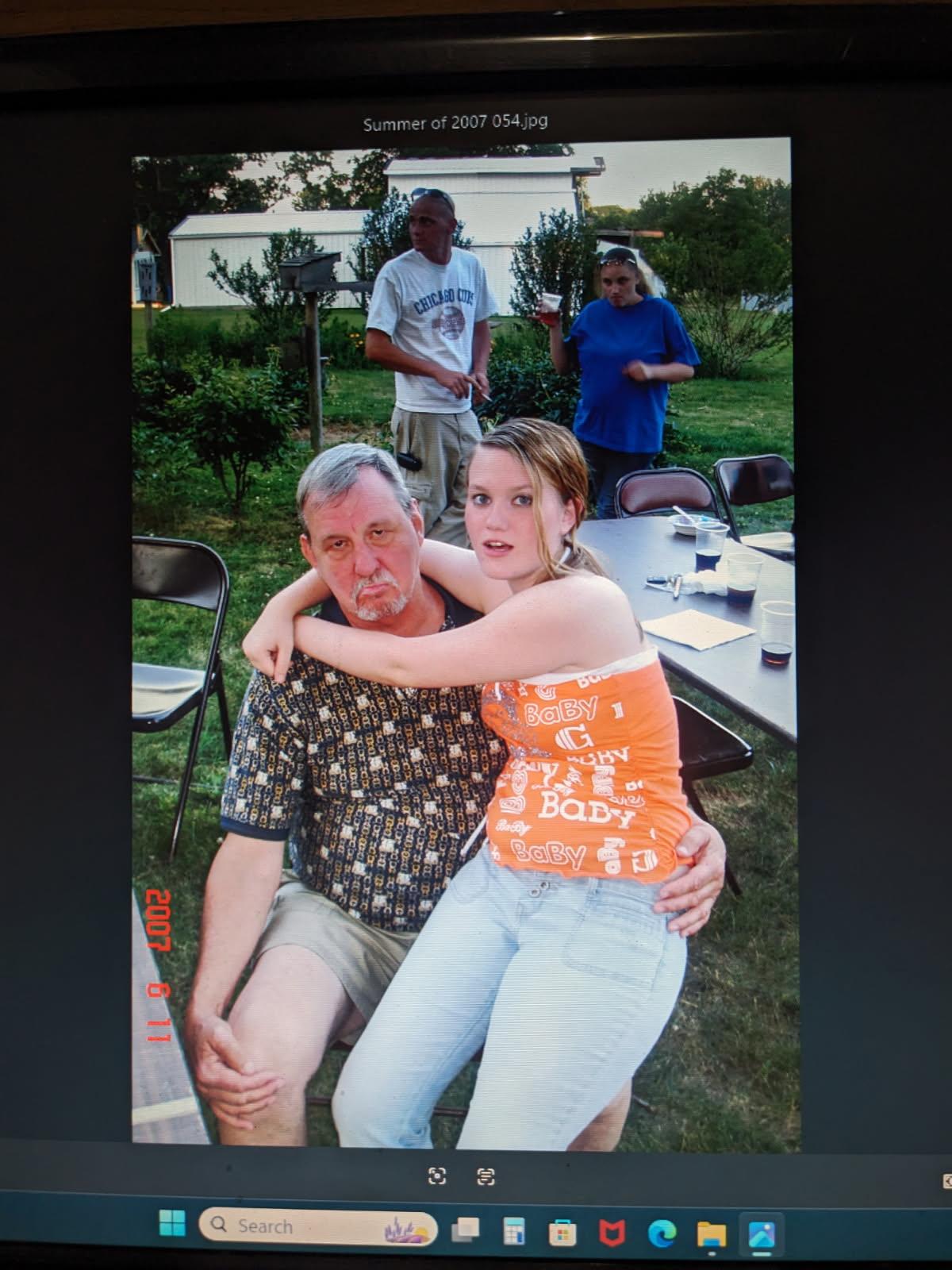 A man and woman posing for a picture