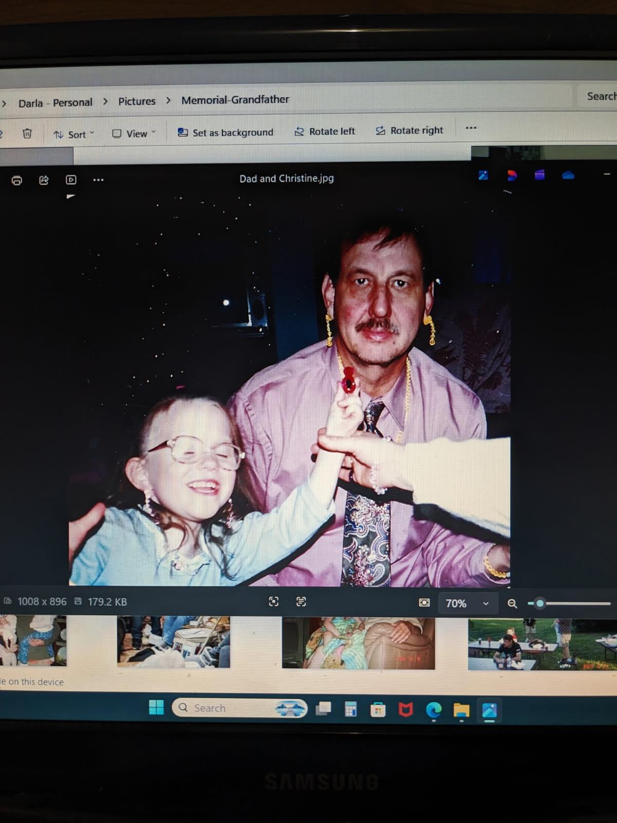 A man and child on a computer screen