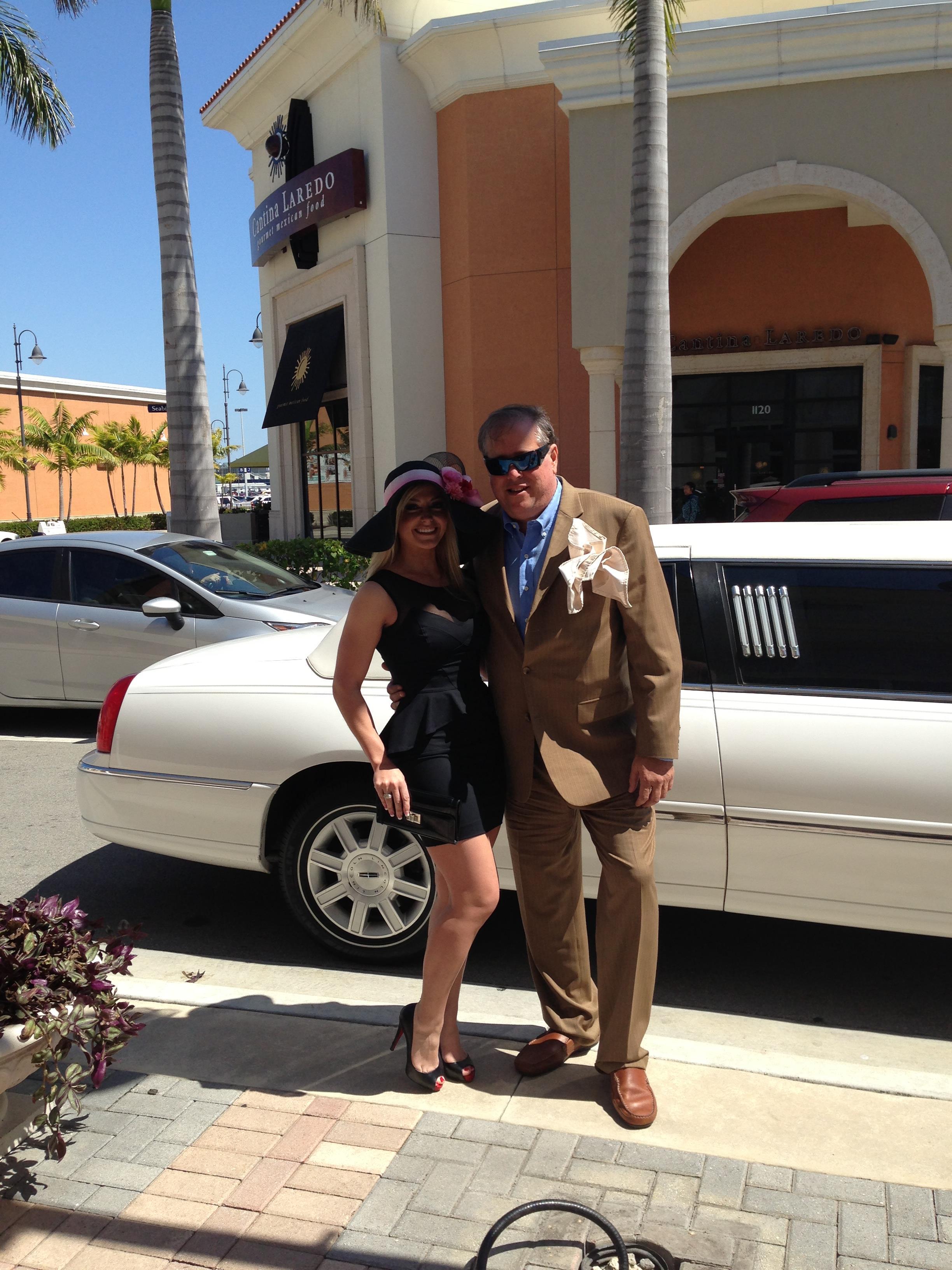 A man and woman posing for a picture