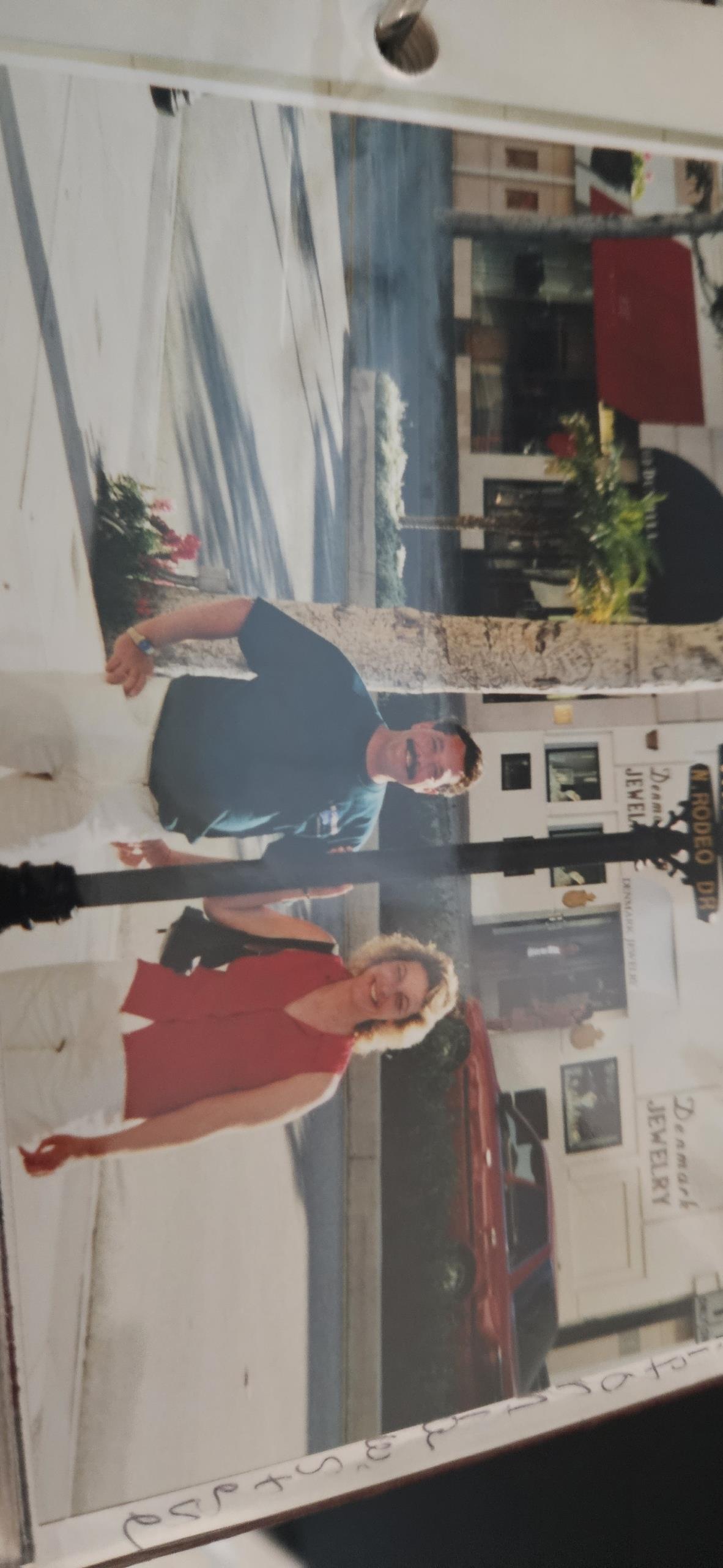 A man and woman posing for a picture