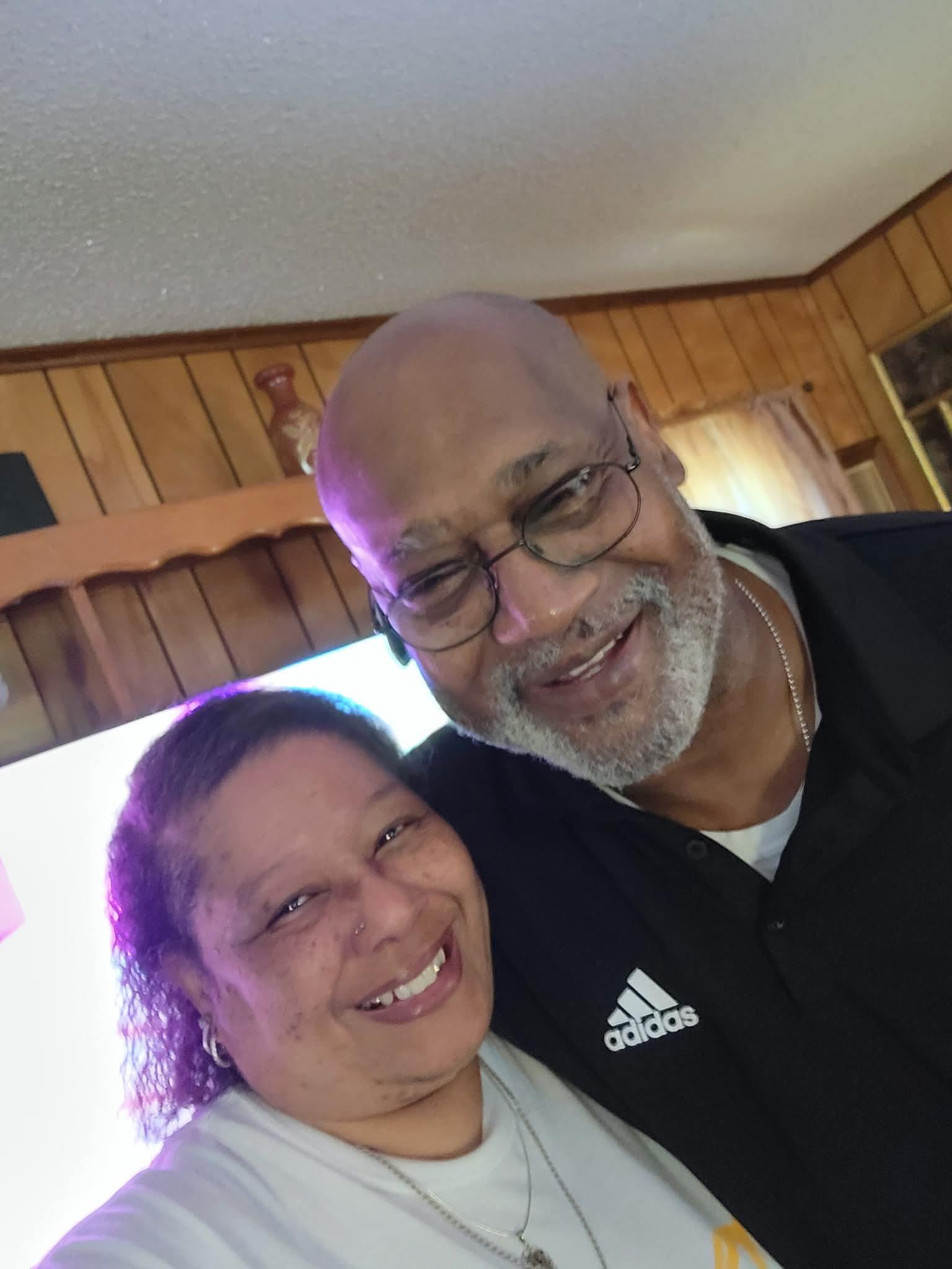 A man and woman taking a selfie