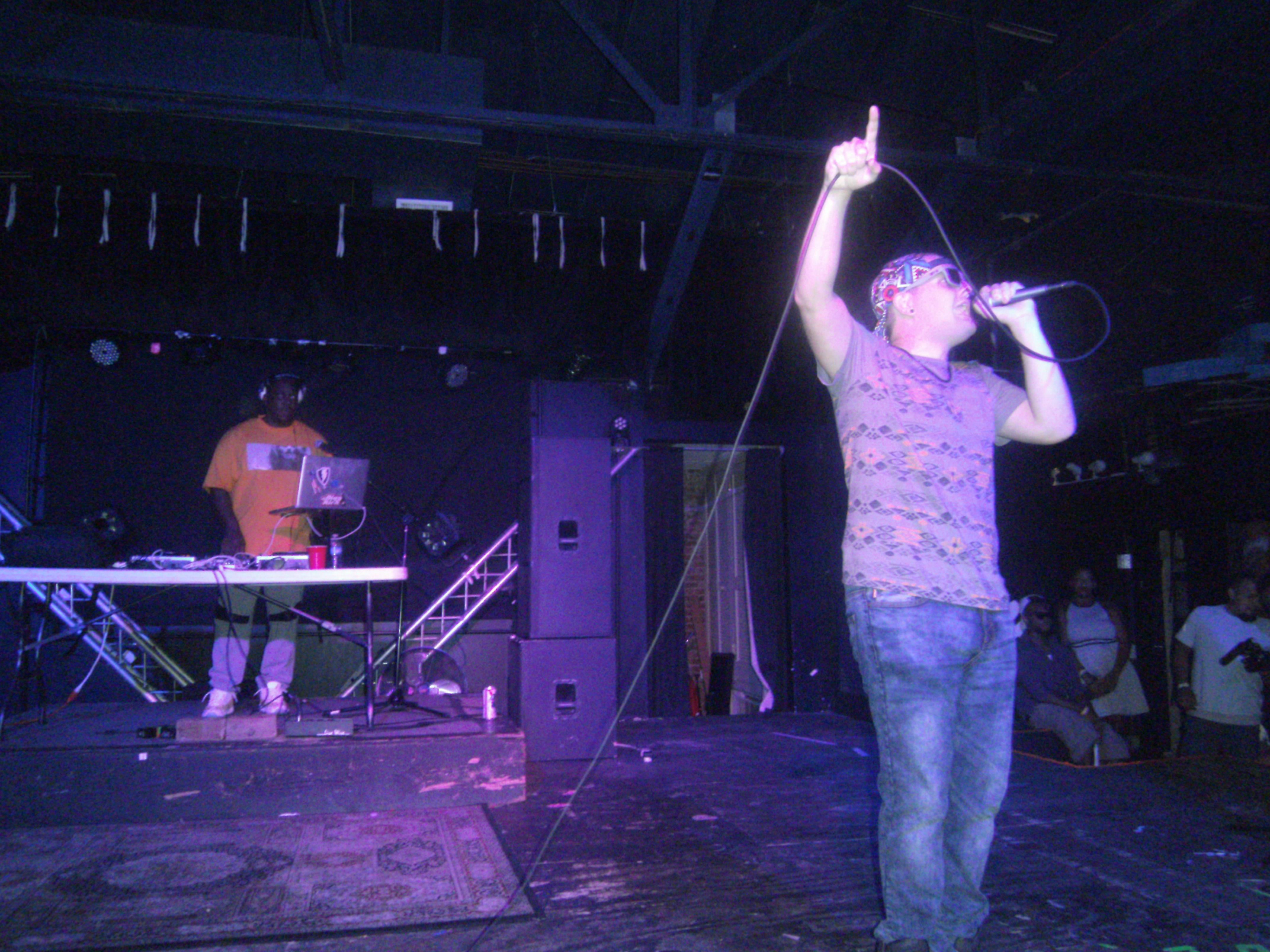 A man singing into a microphone