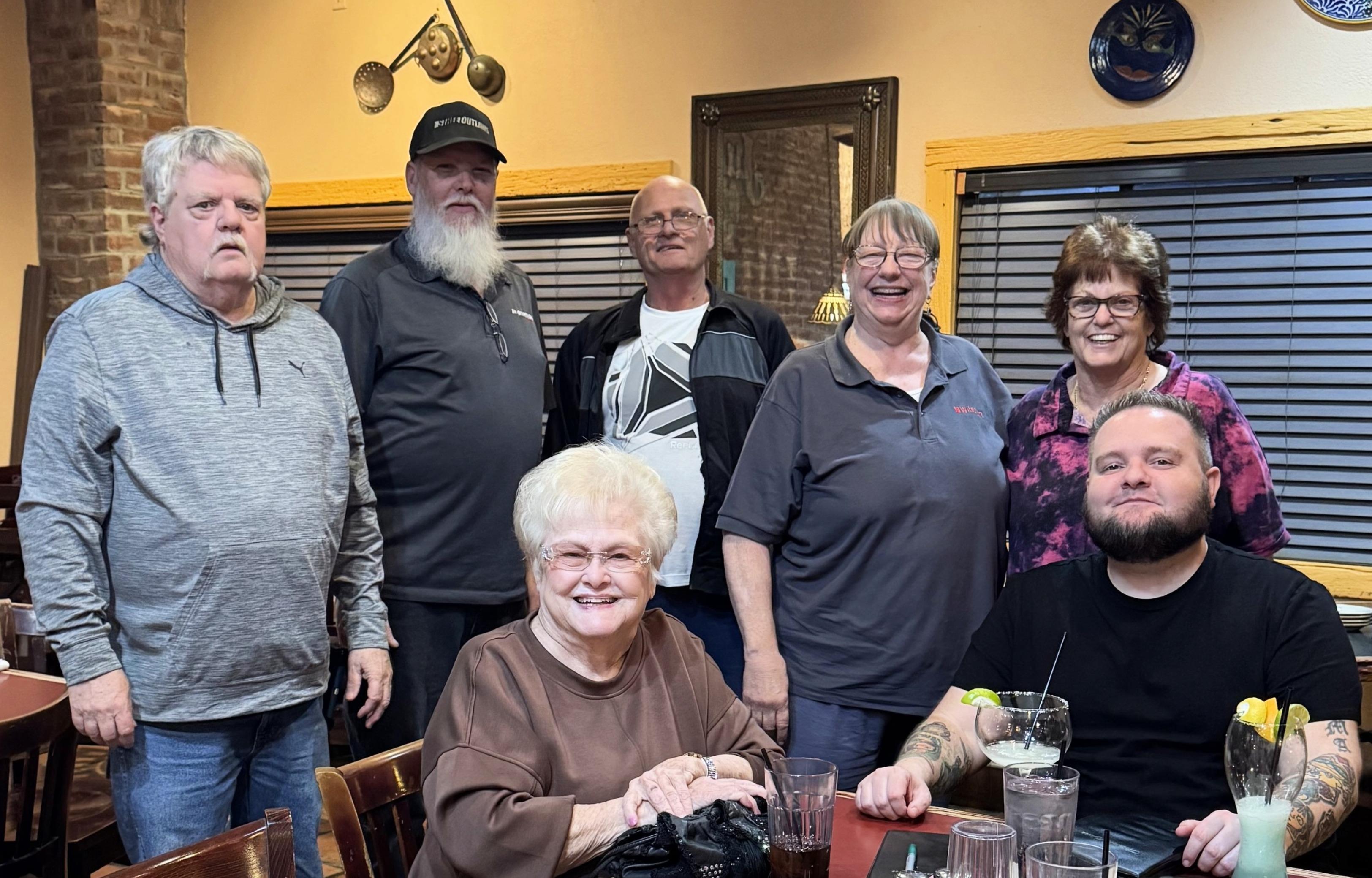 A group of people posing for a photo