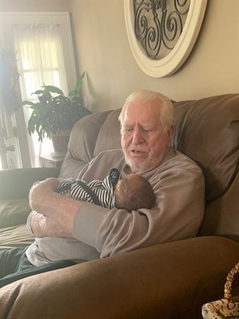 A man holding a baby