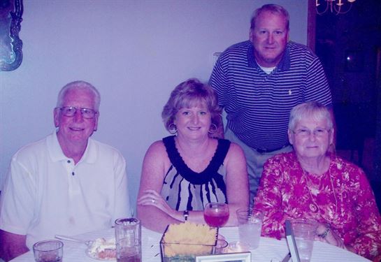 A group of people sitting at a table