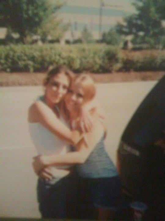 A couple of women hugging