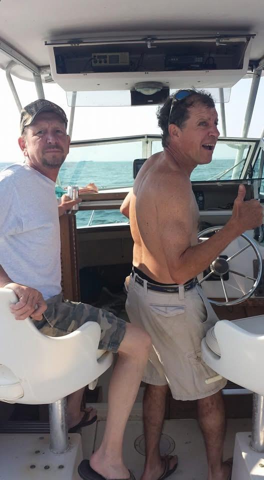 Two men on a boat