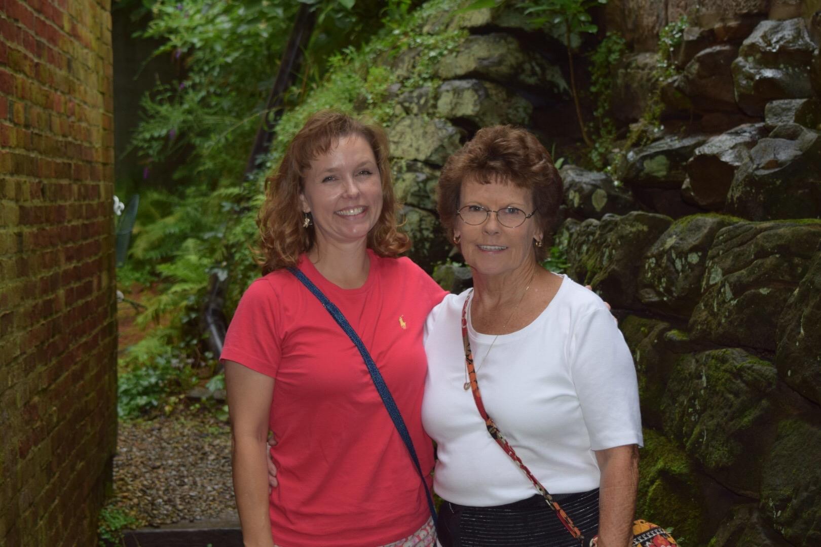 Two women standing next to each other