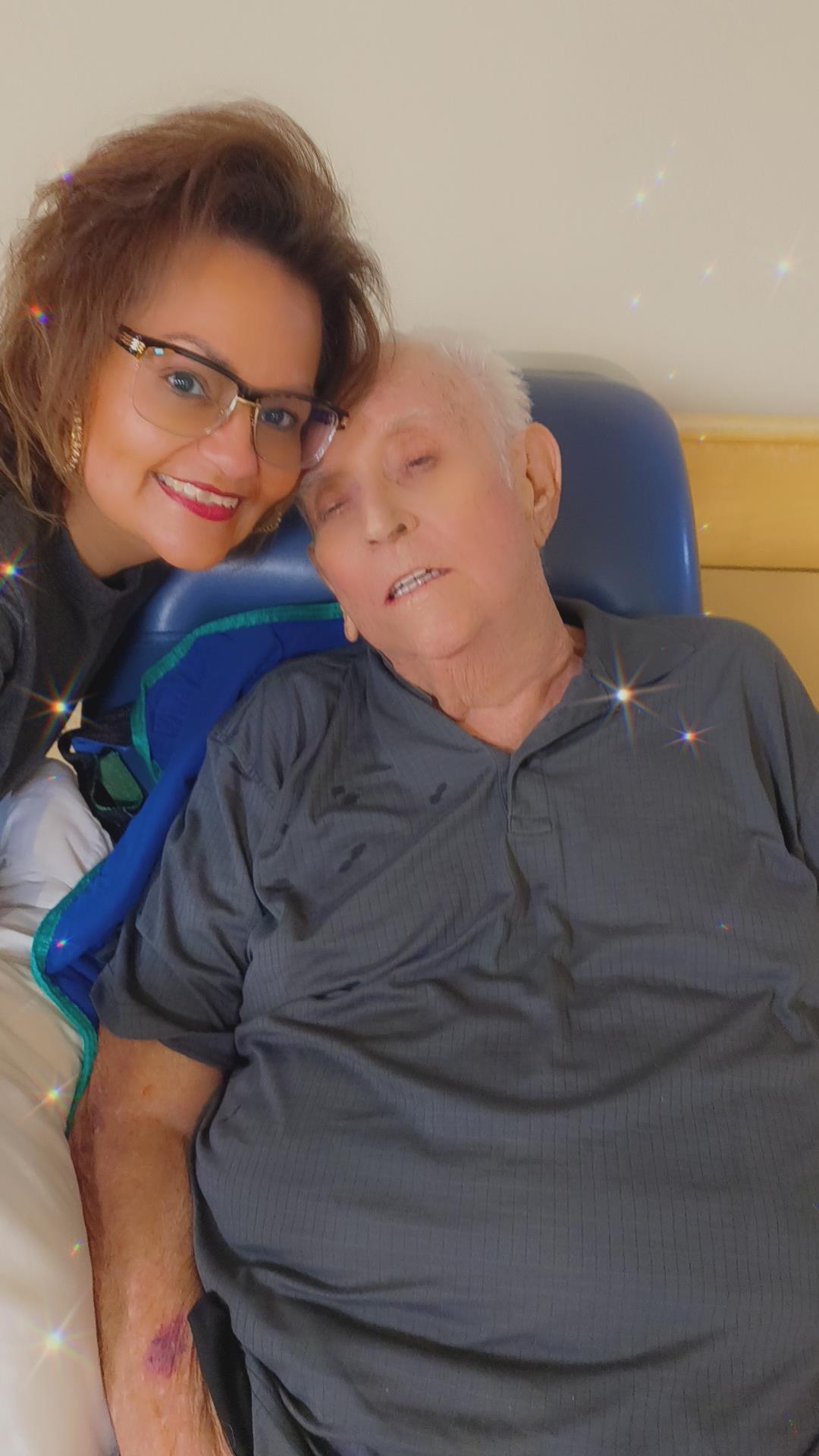 A woman and a man lying on a bed
