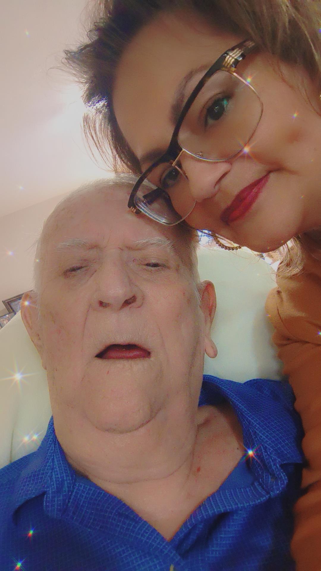 A woman and man taking a selfie