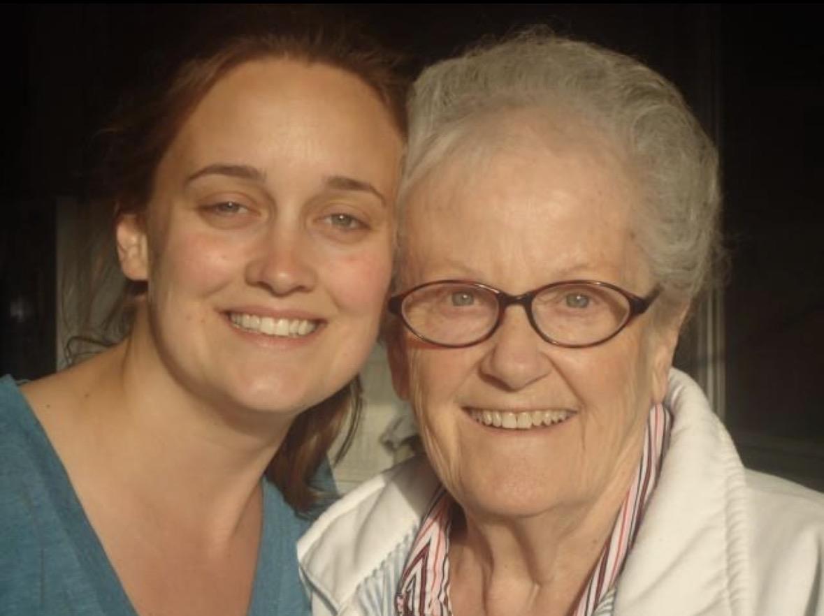 A woman and an older woman smiling
