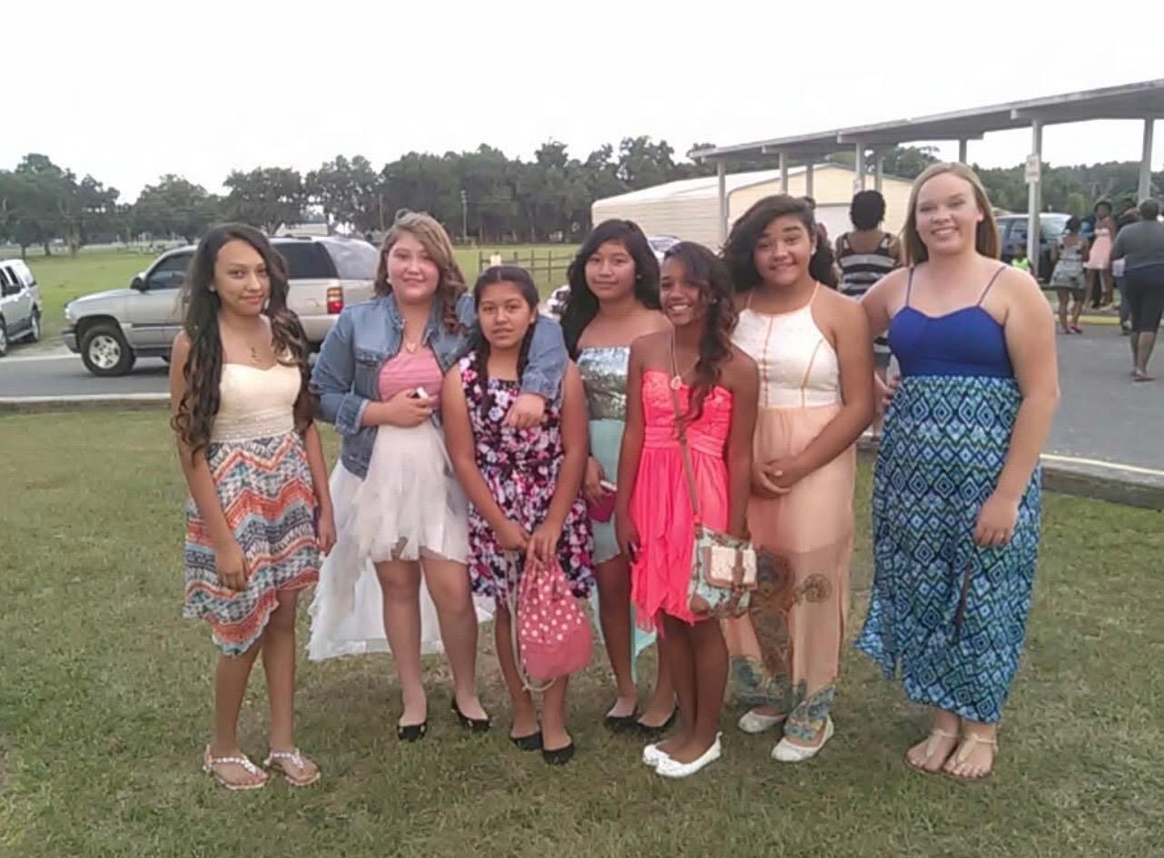 A group of girls posing for a photo