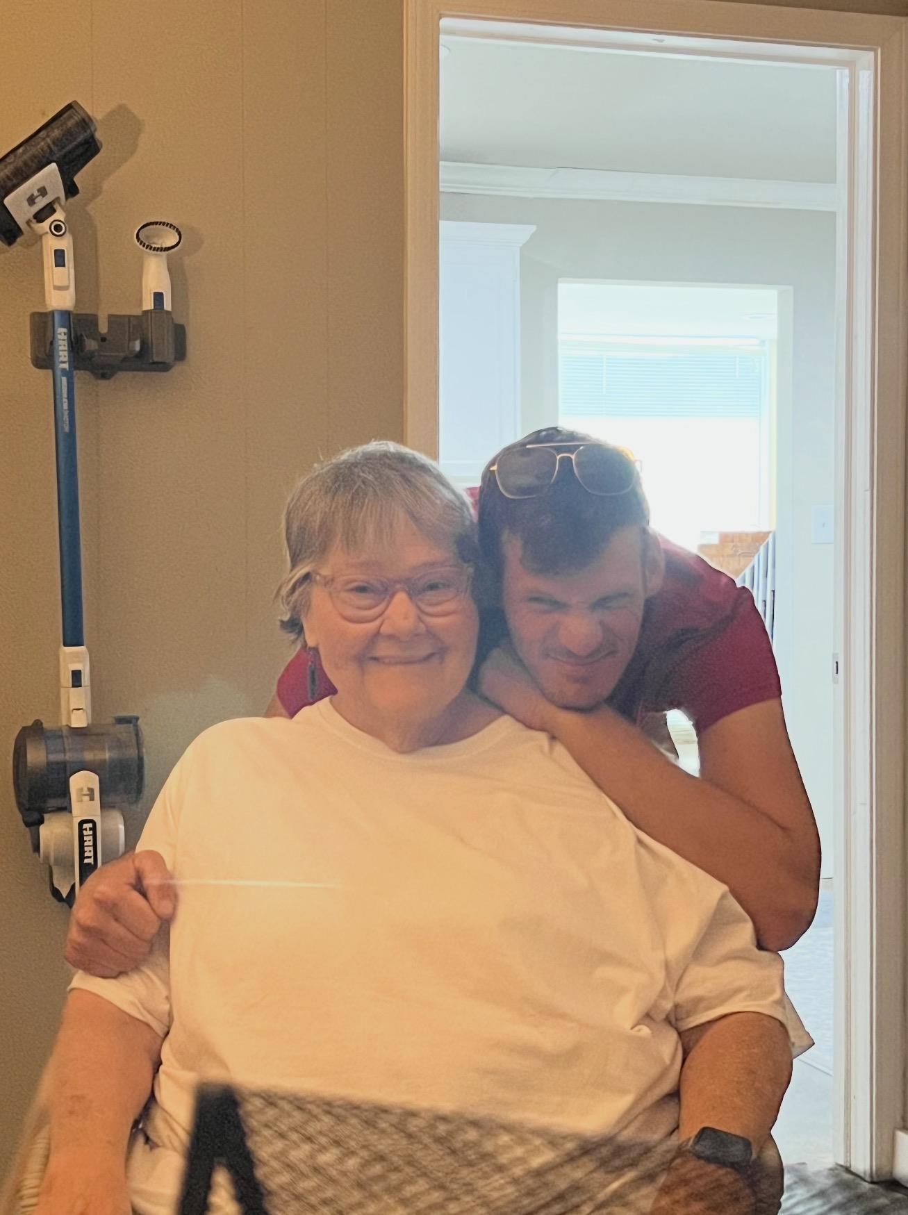 A man hugging a woman