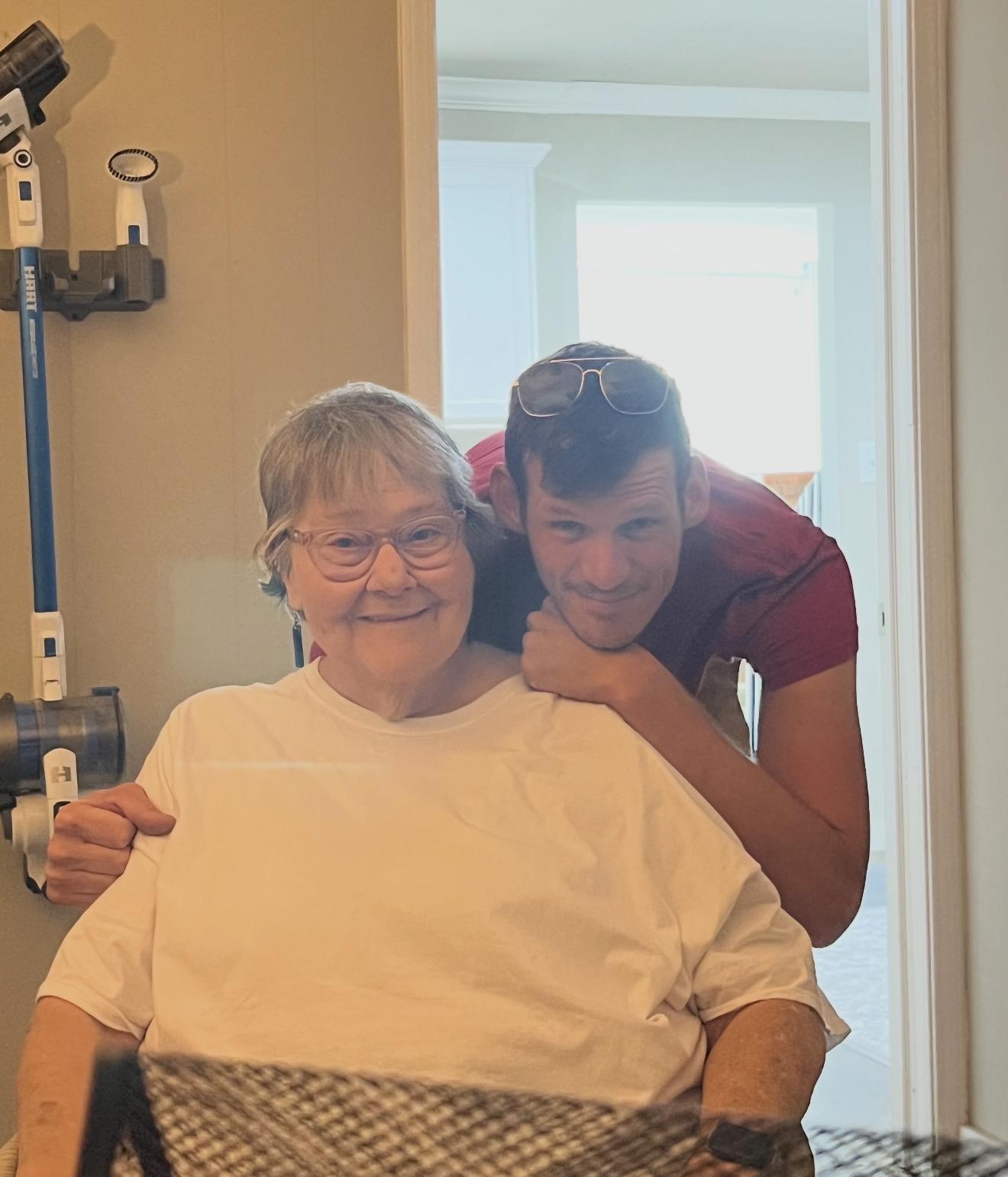 A man hugging a woman