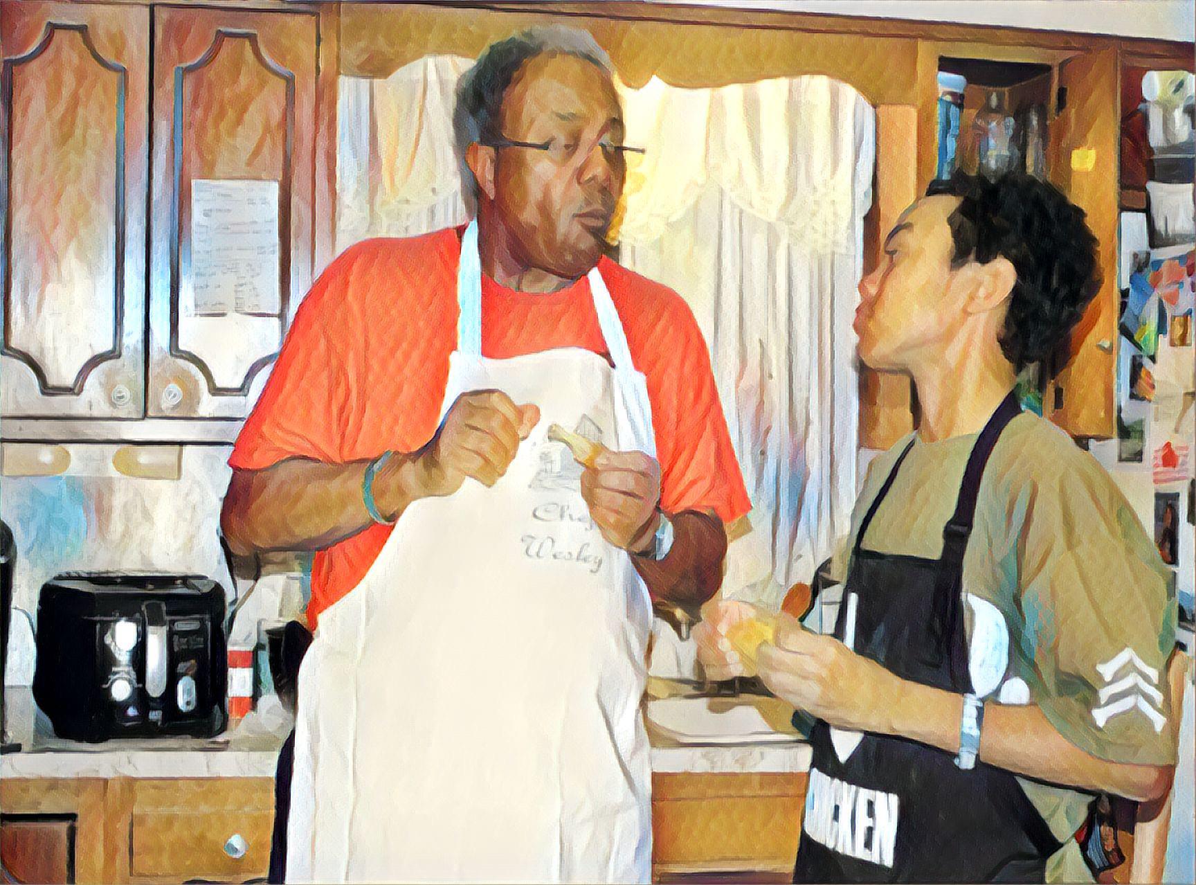 A man in an apron and a man in an apron