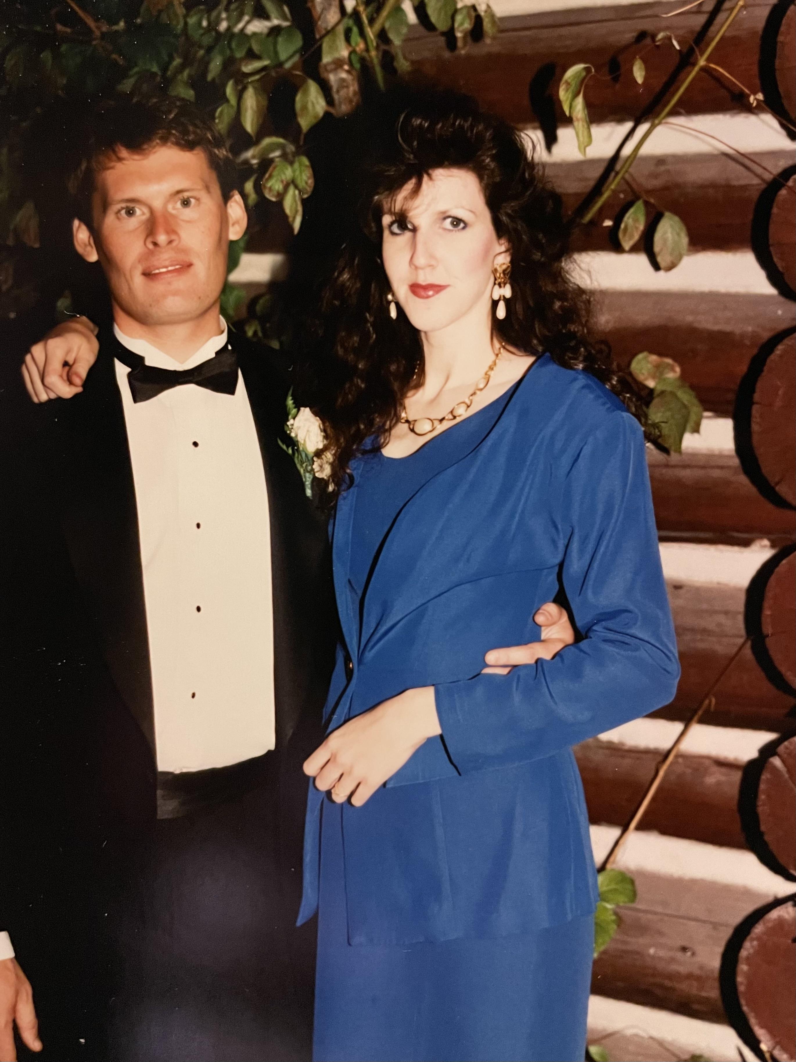 A man and woman posing for a picture
