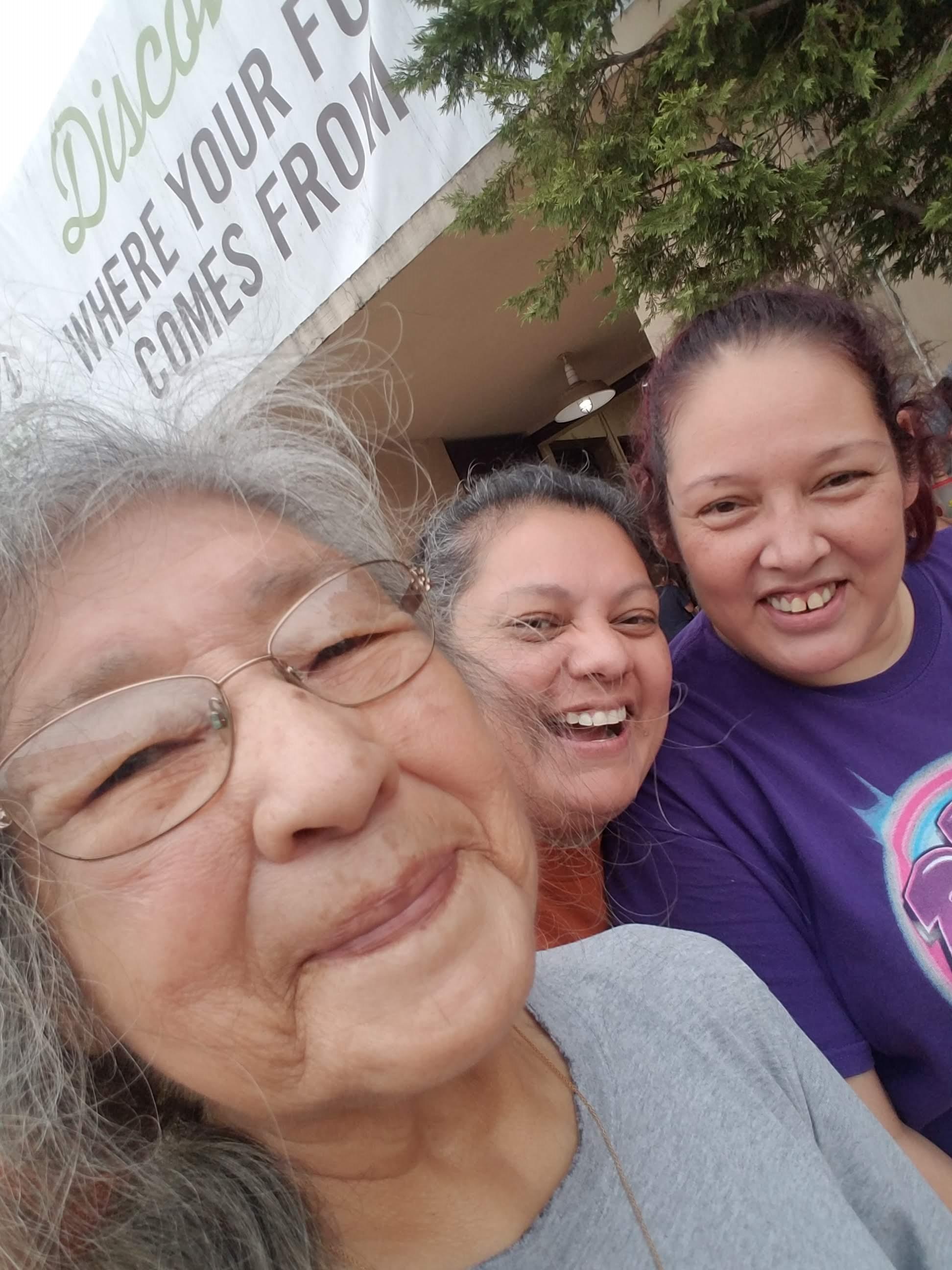 A group of women smiling for a selfie