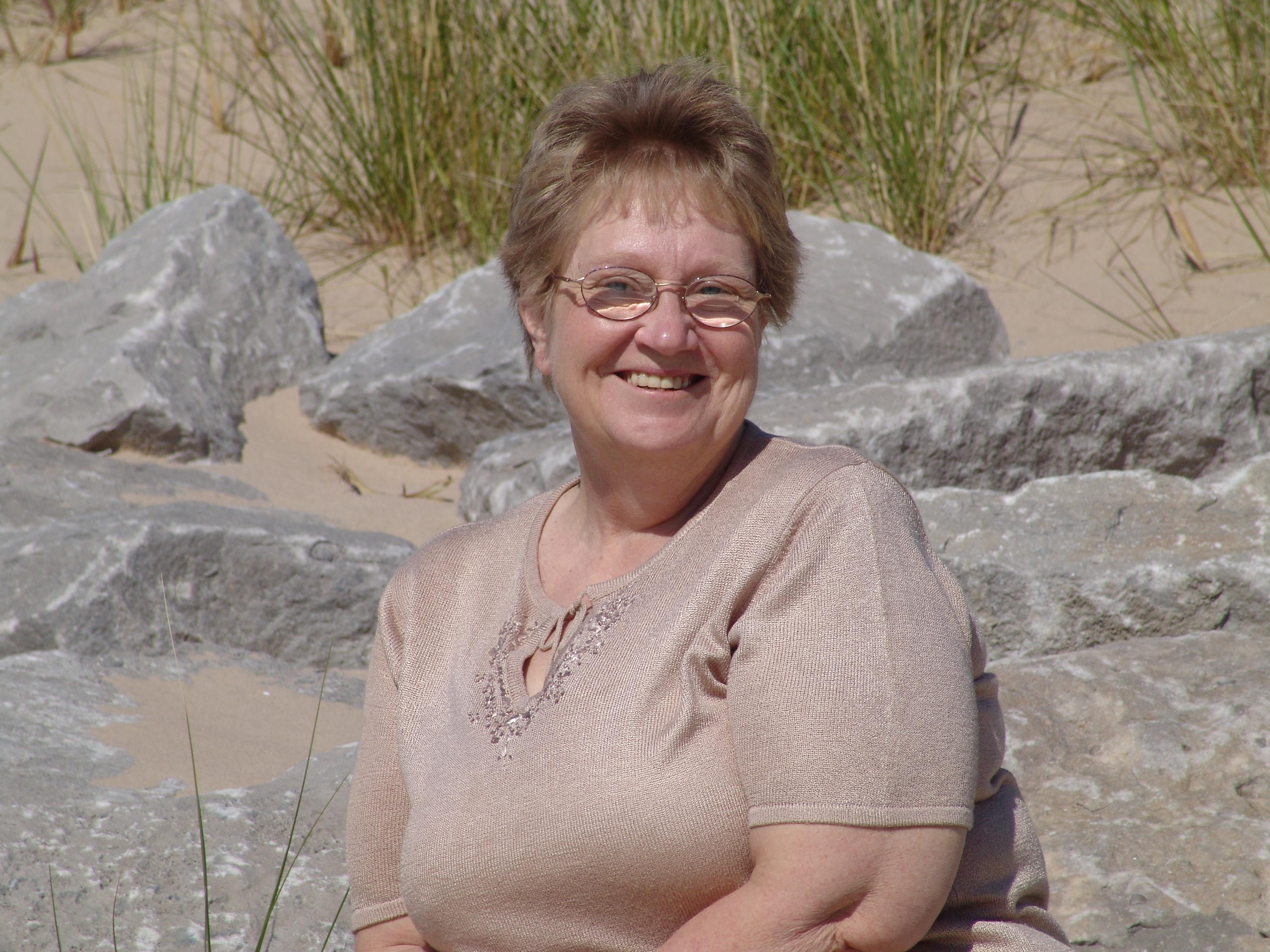 A woman smiling at camera
