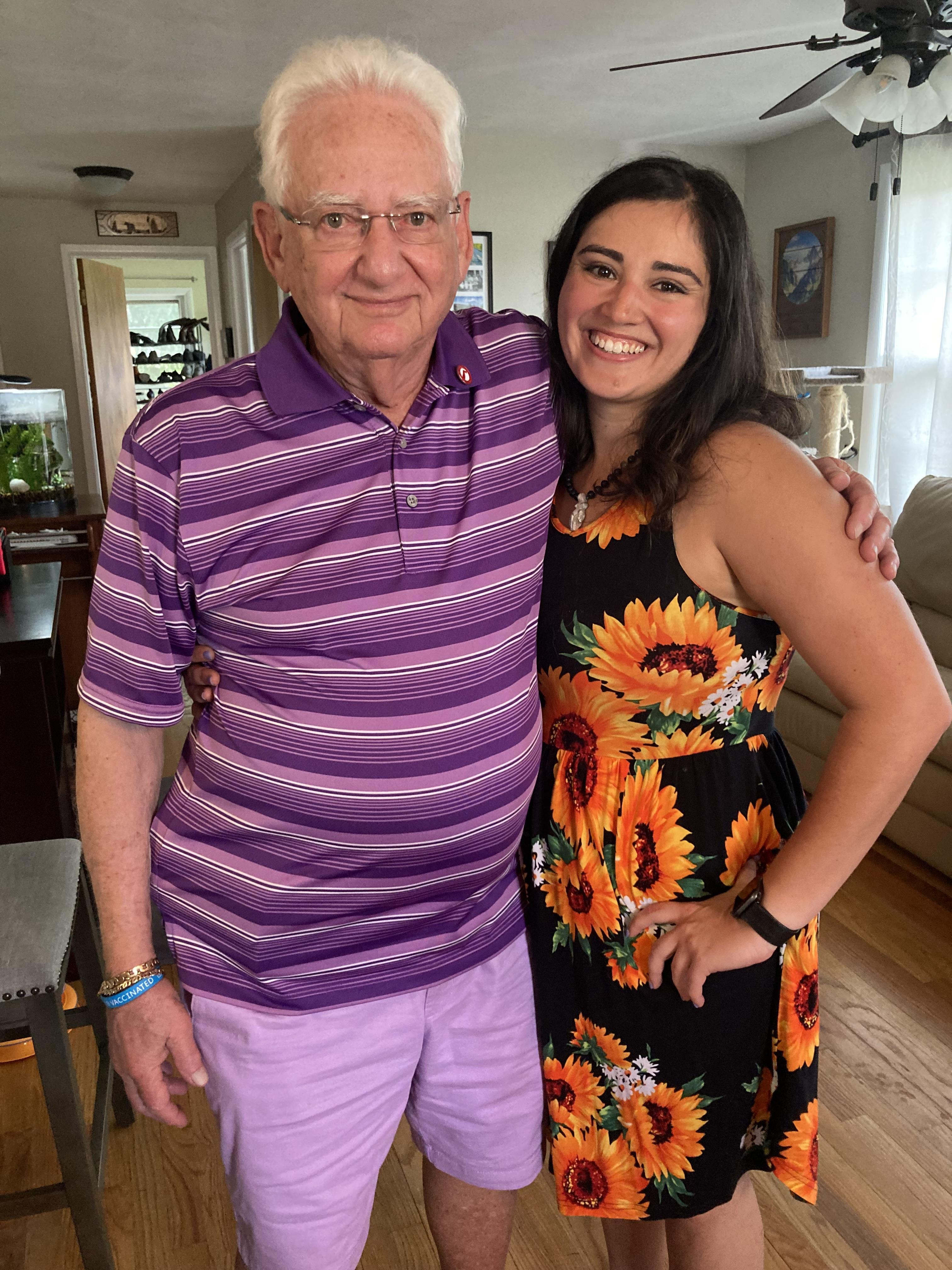 A man and woman posing for a picture