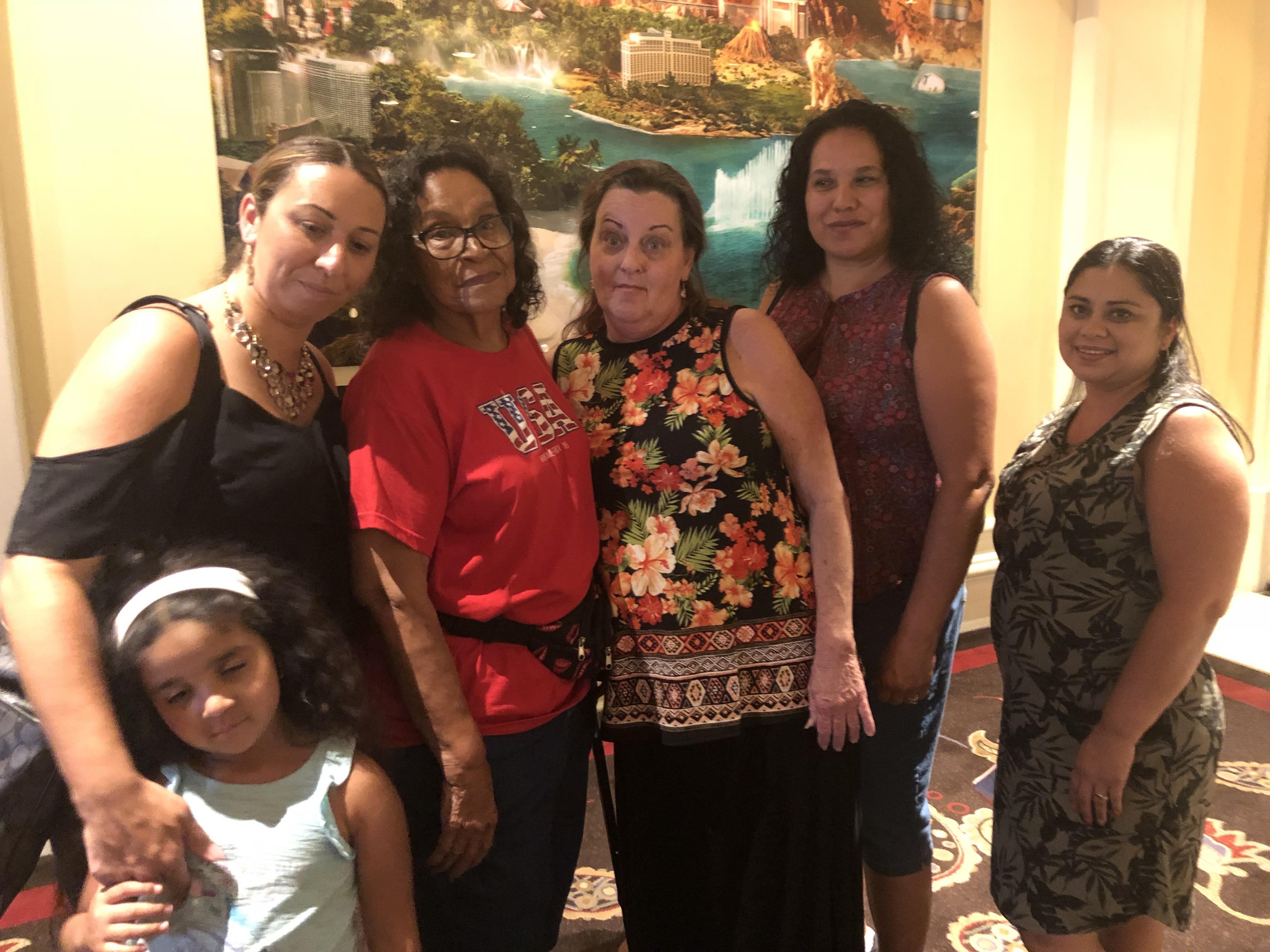 A group of women posing for a photo