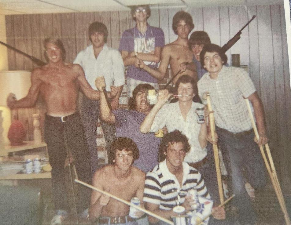 A group of men posing for a photo