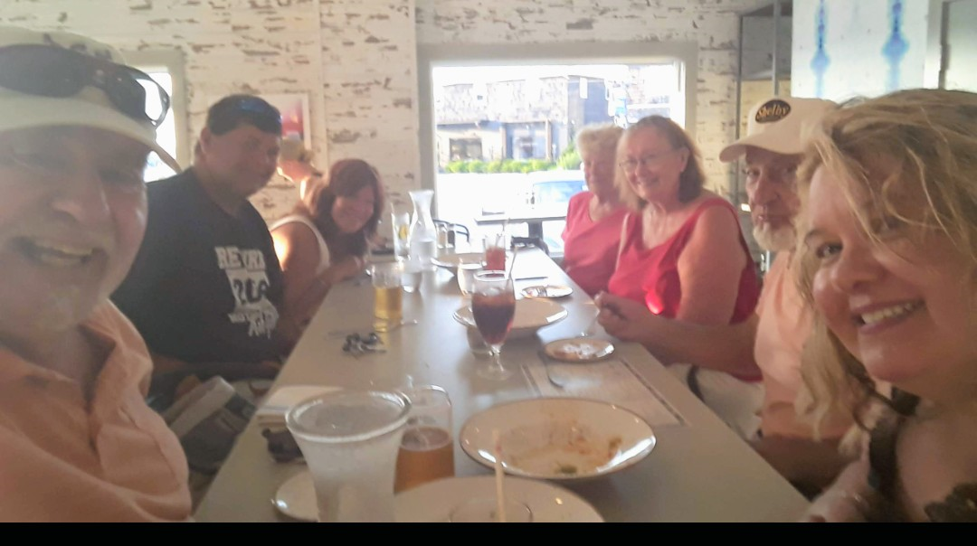 A group of people sitting at a table
