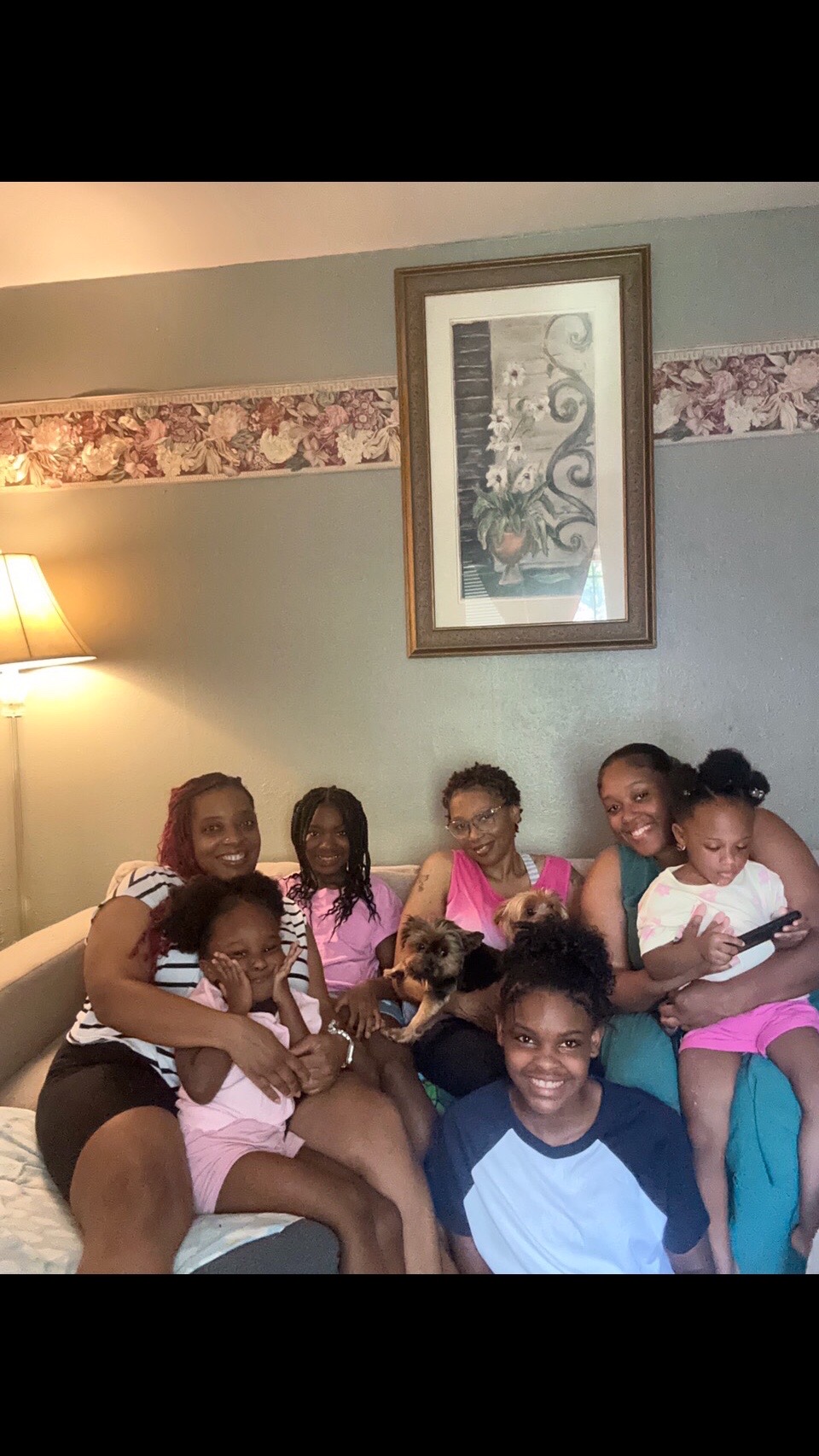 A group of people sitting on a couch