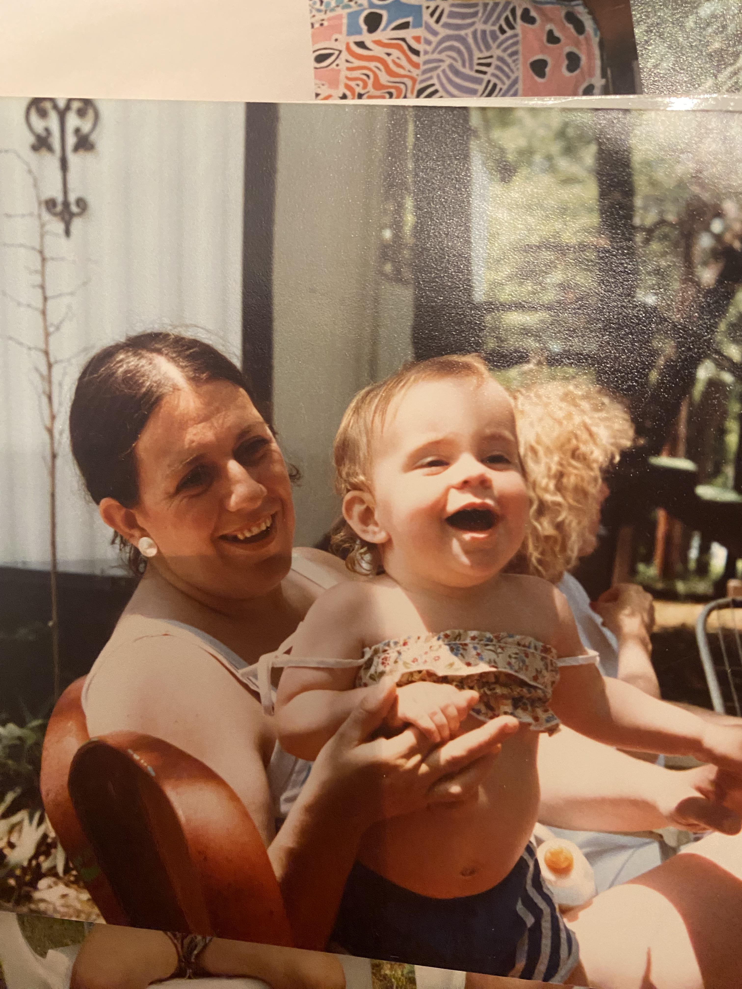 A woman holding a baby