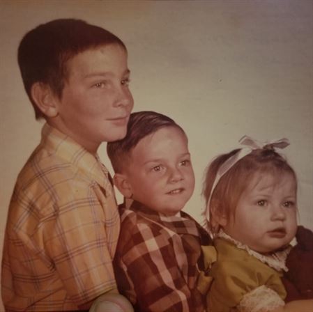 A group of children posing for a photo