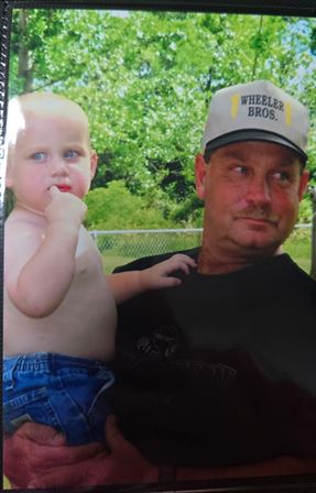 A man holding a baby