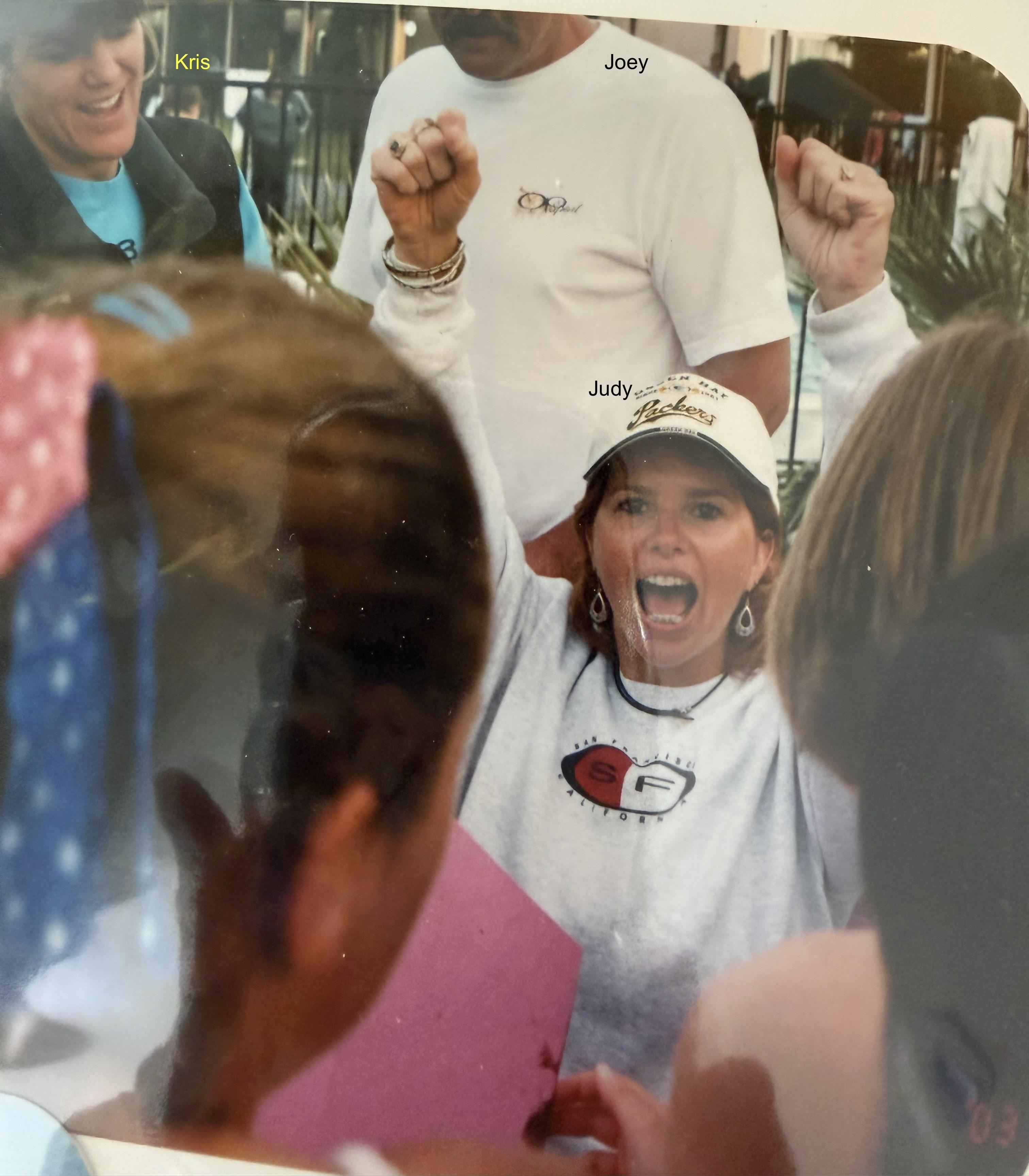 A man and woman cheering