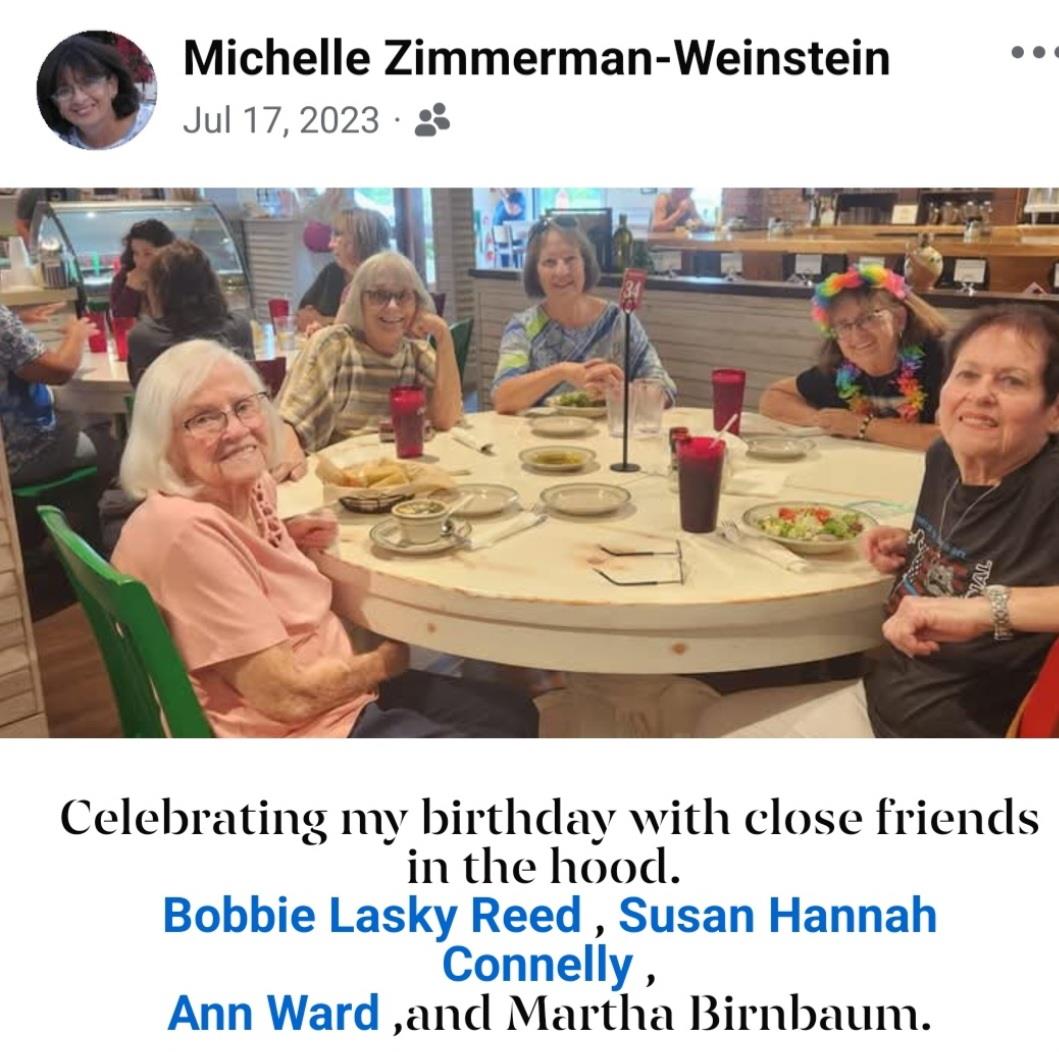 A group of women sitting at a table