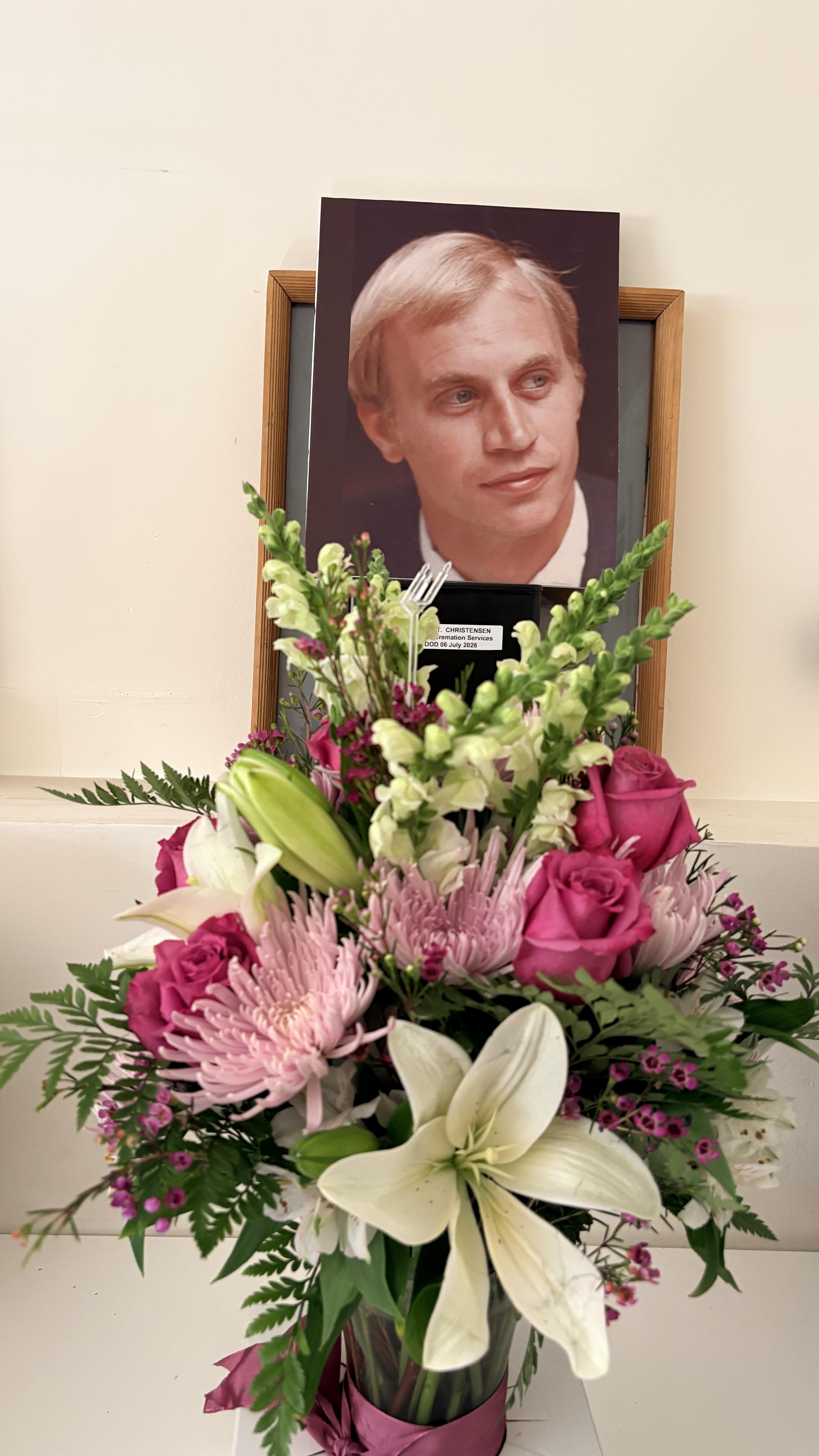 A bouquet of flowers in a frame
