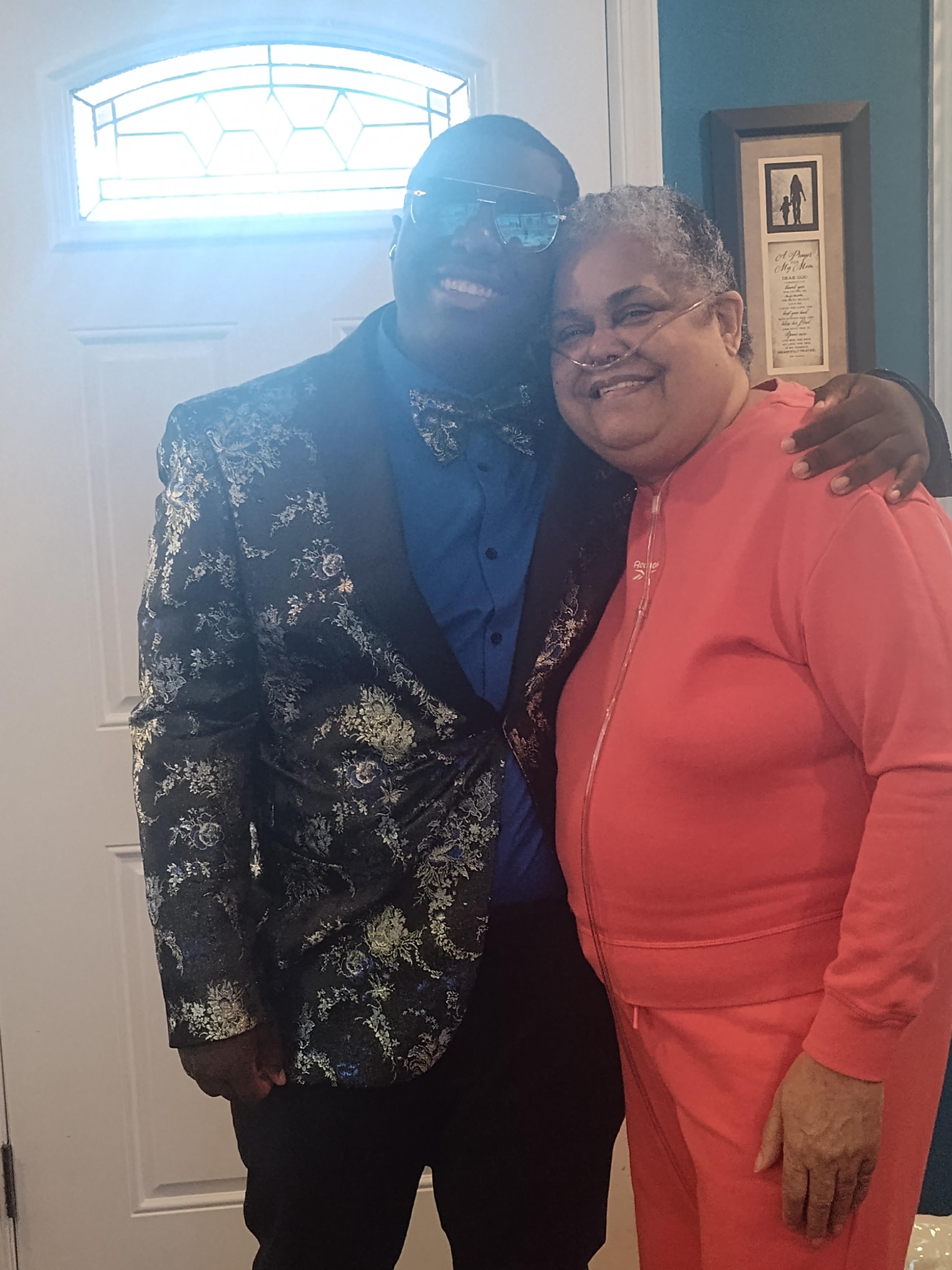 A man and woman posing for a picture