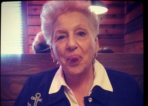 A woman sticking her tongue out