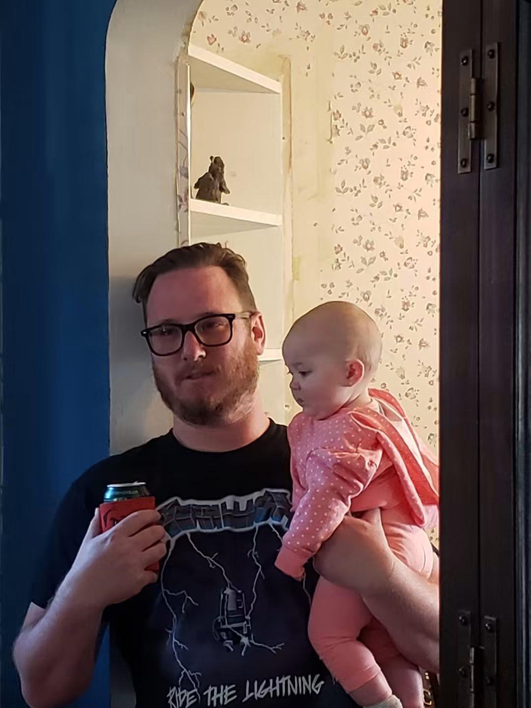 A man holding a baby