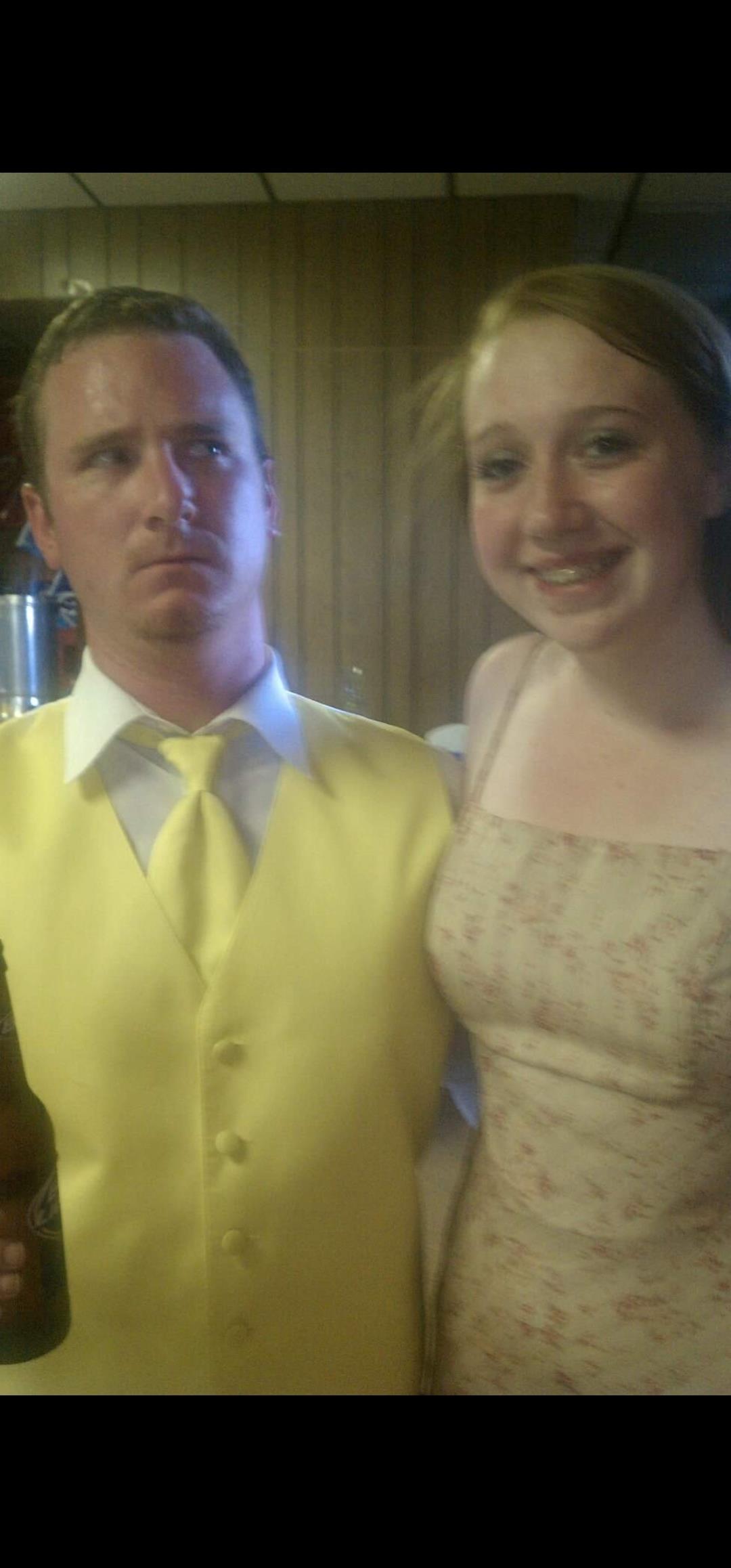 A man and woman in formal attire