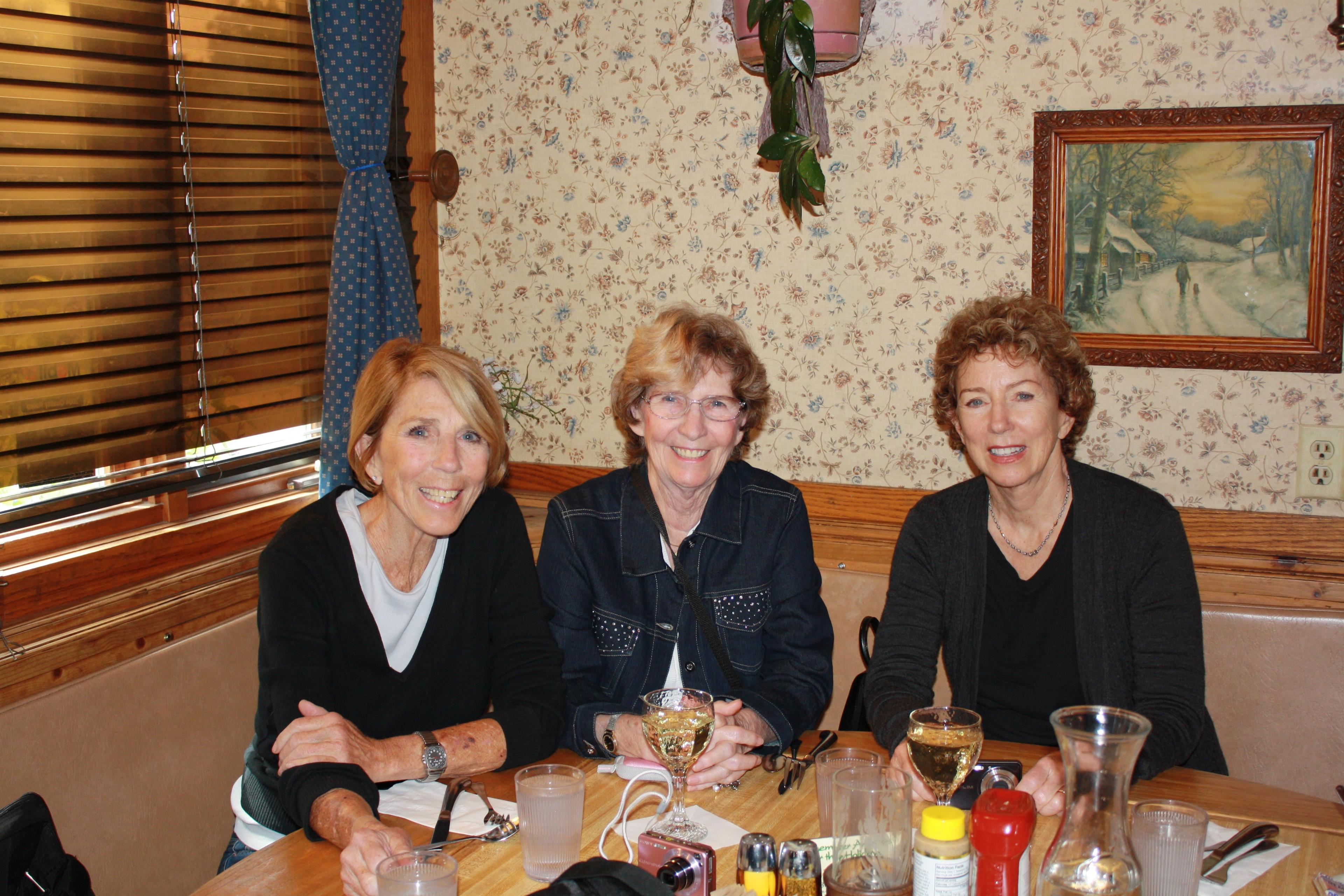 A group of women sitting at a table