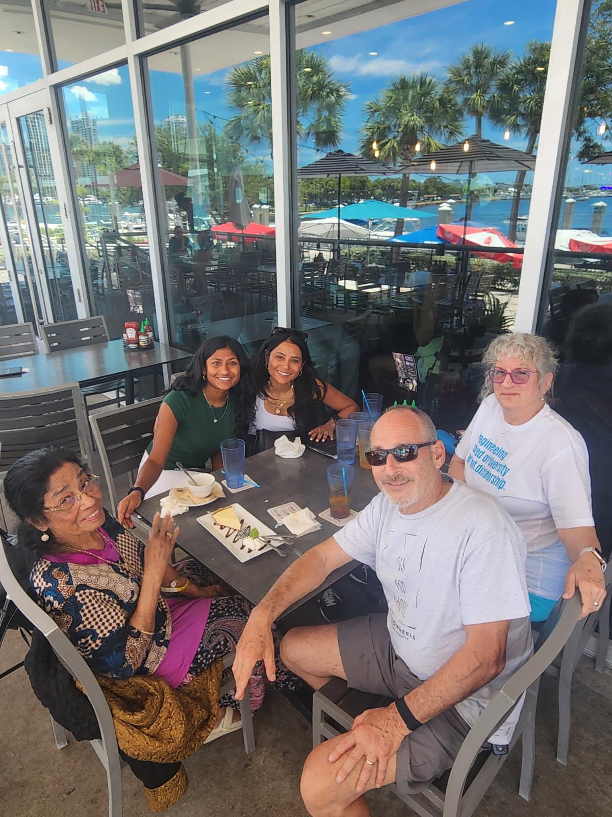 A group of people sitting at a table