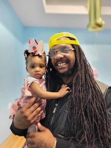 A man holding a baby