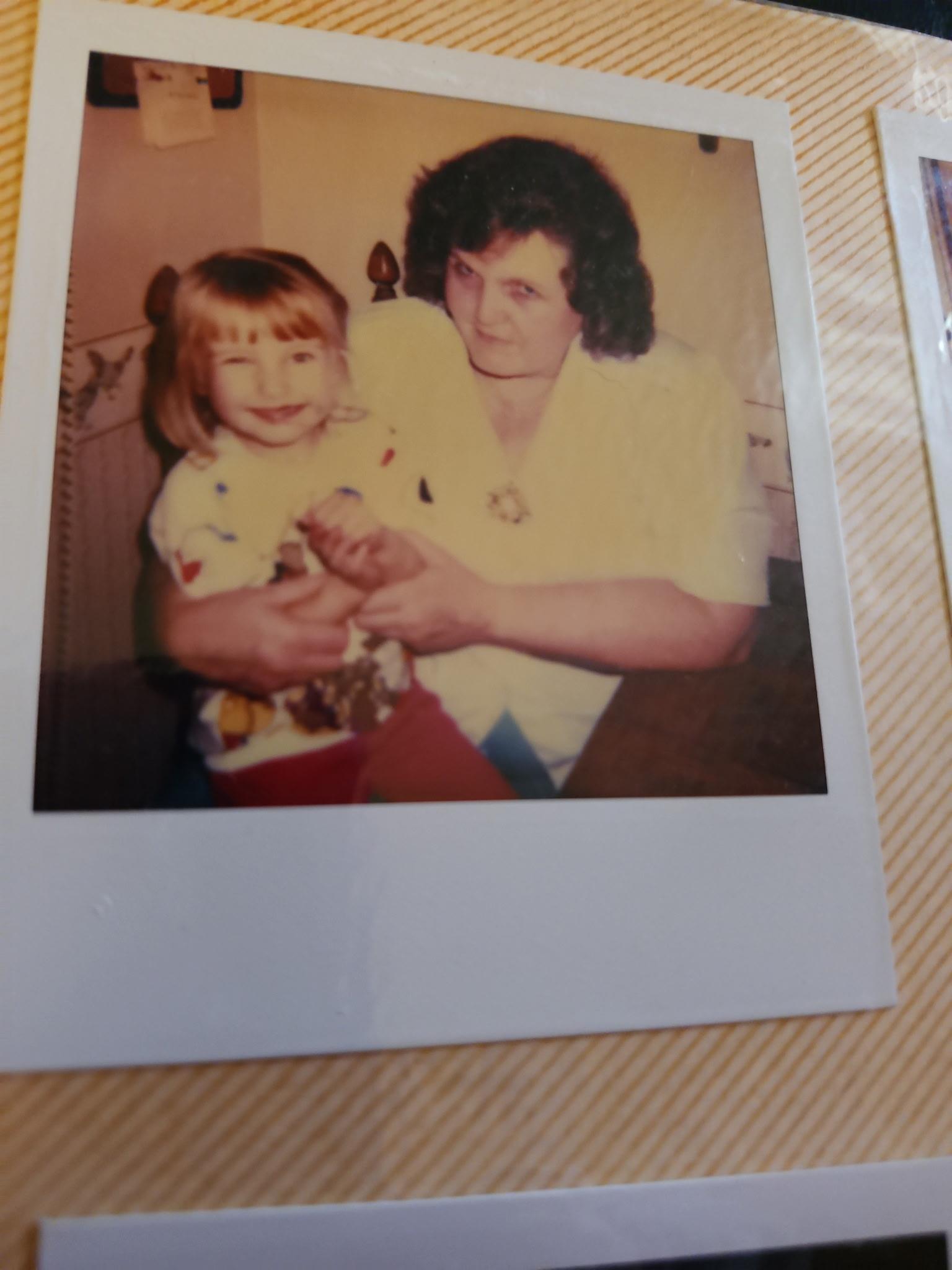 A woman holding a child