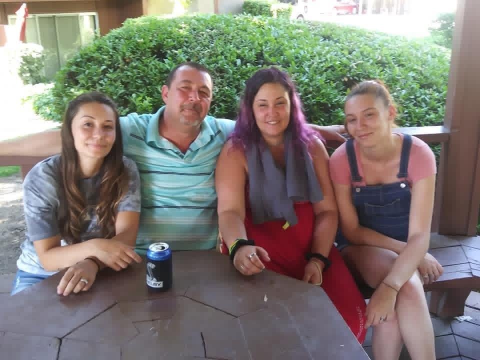 A group of people sitting at a table