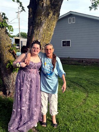 A man and woman standing next to each other