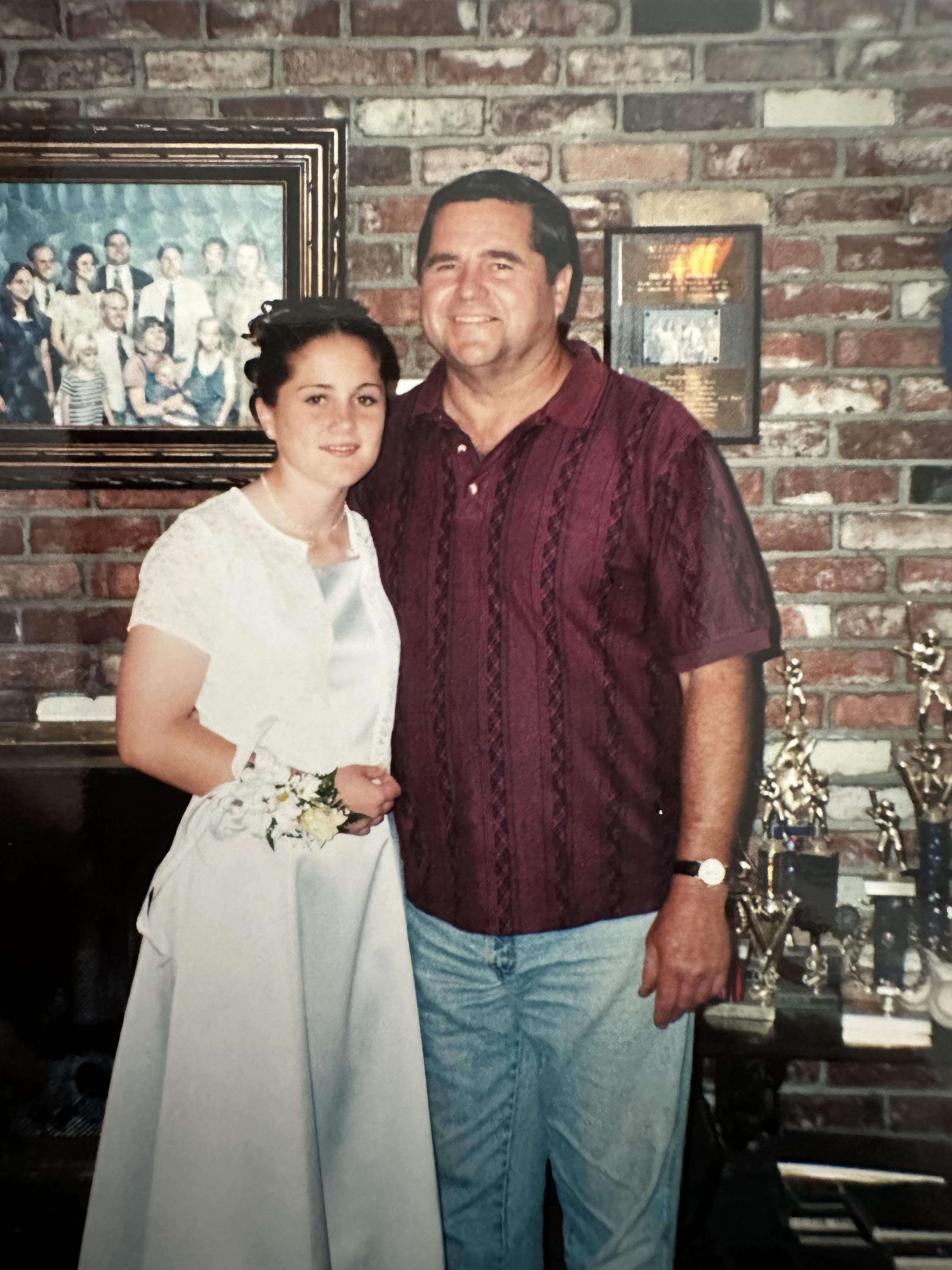 A man and woman posing for a picture