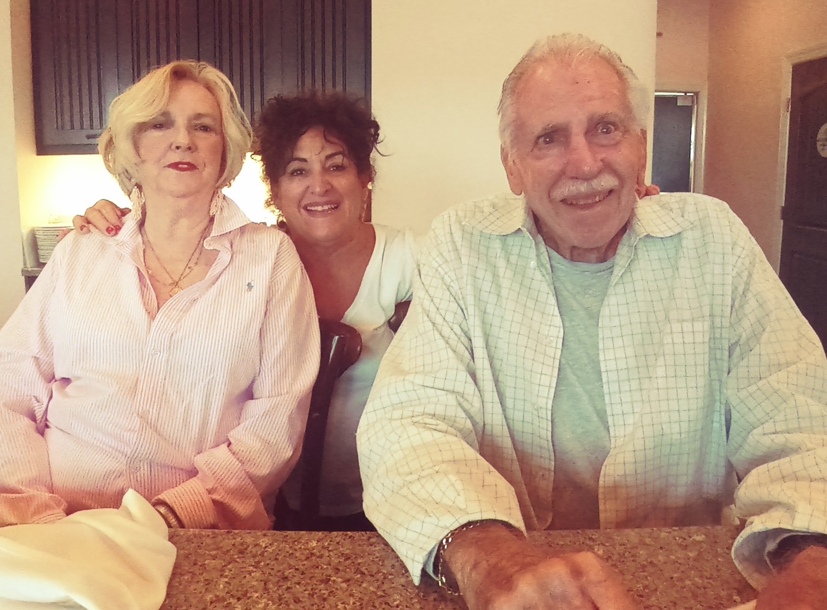 A group of people sitting at a table