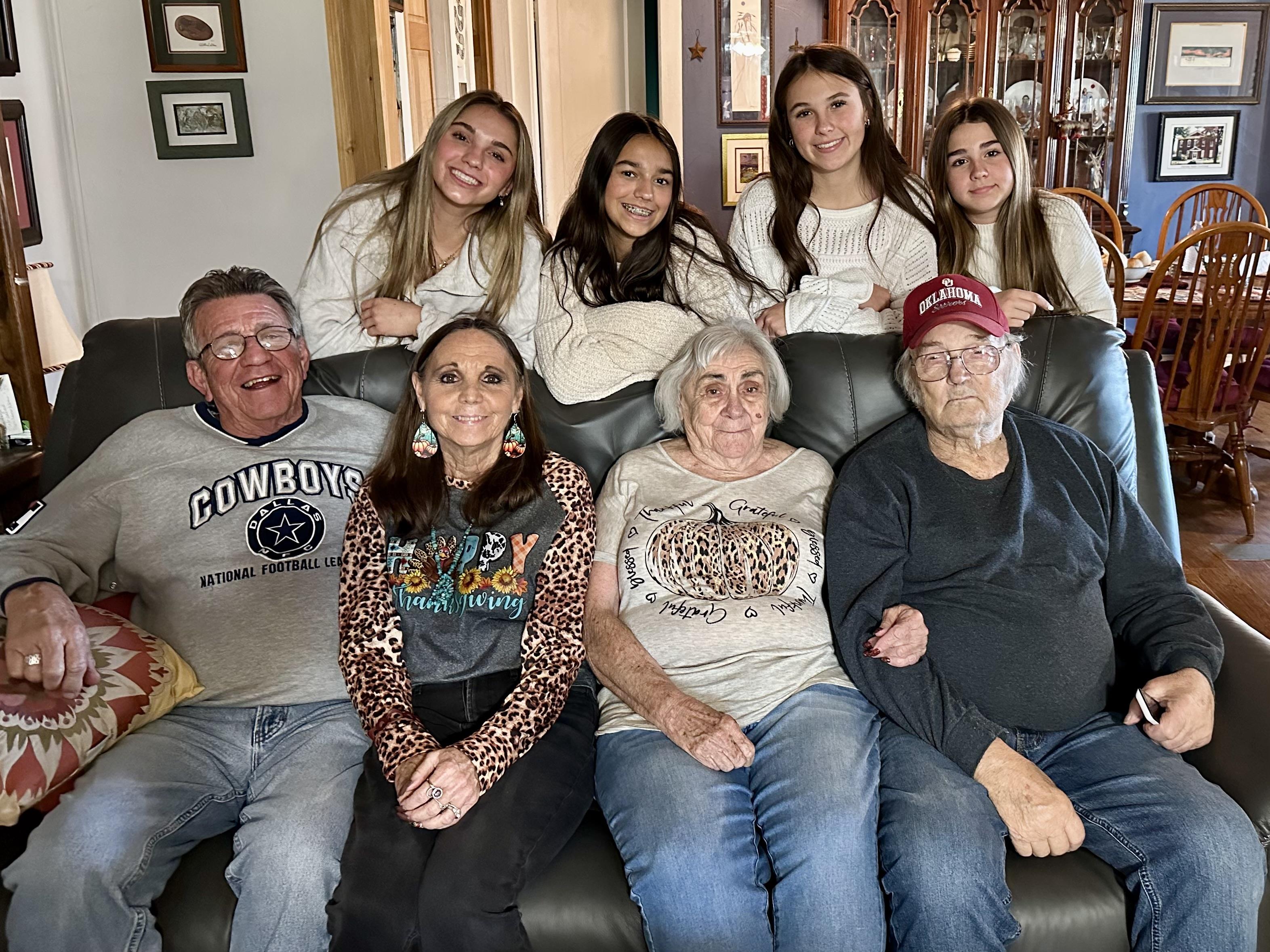 A group of people posing for a photo