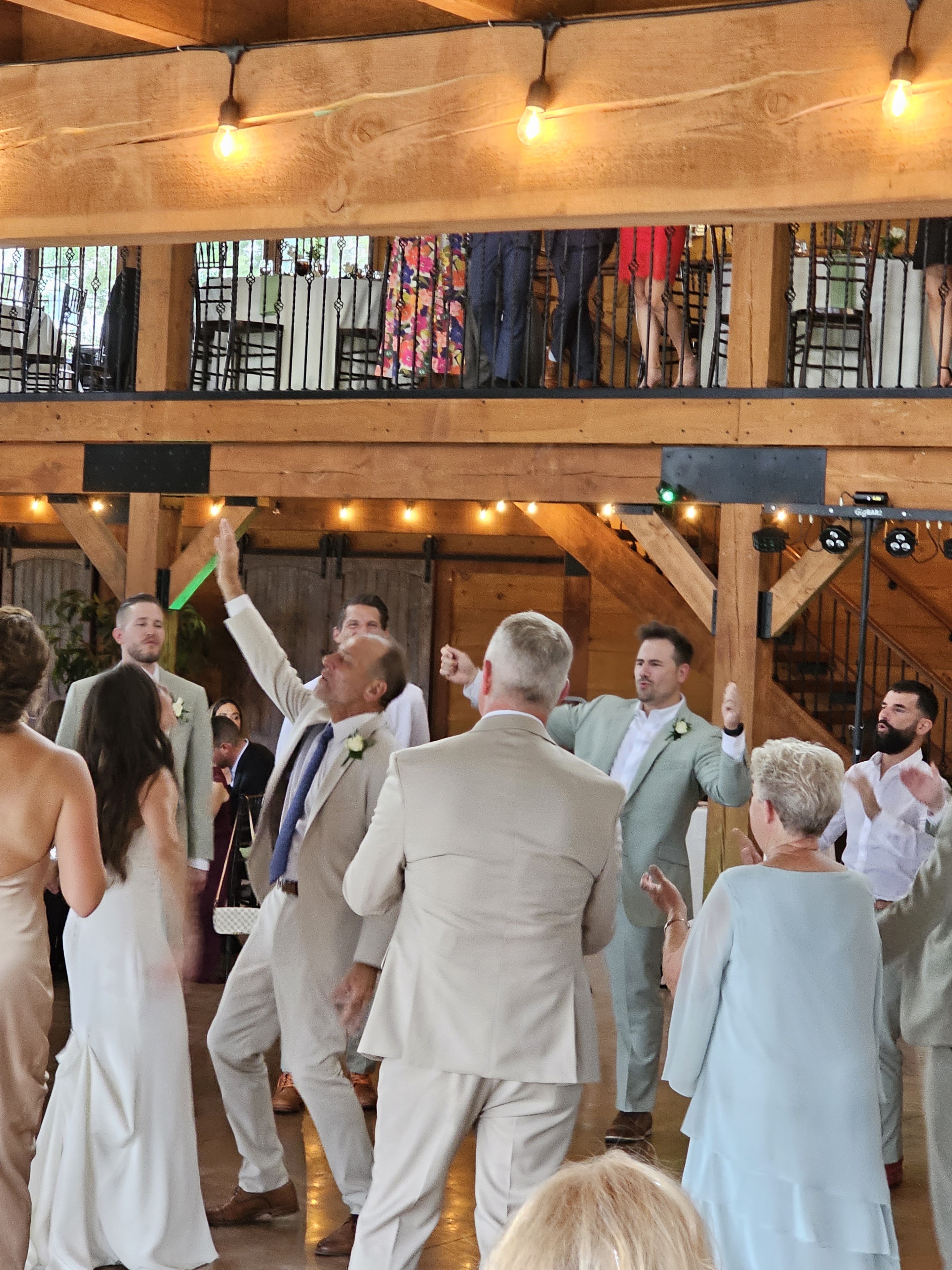 A group of people dancing in a room