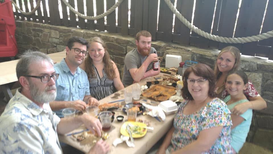 A group of people sitting at a table